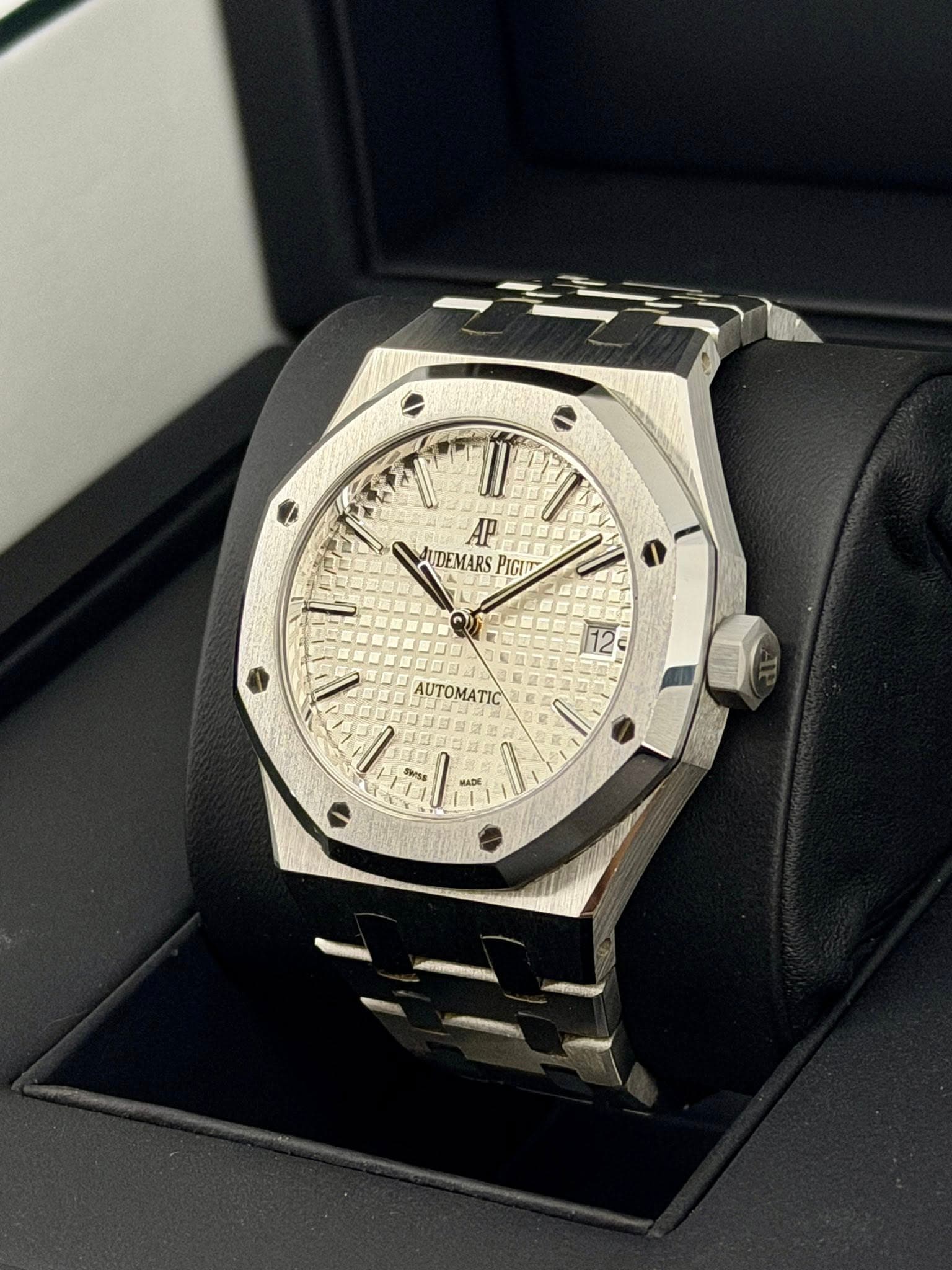 May be an image of wrist watch and text