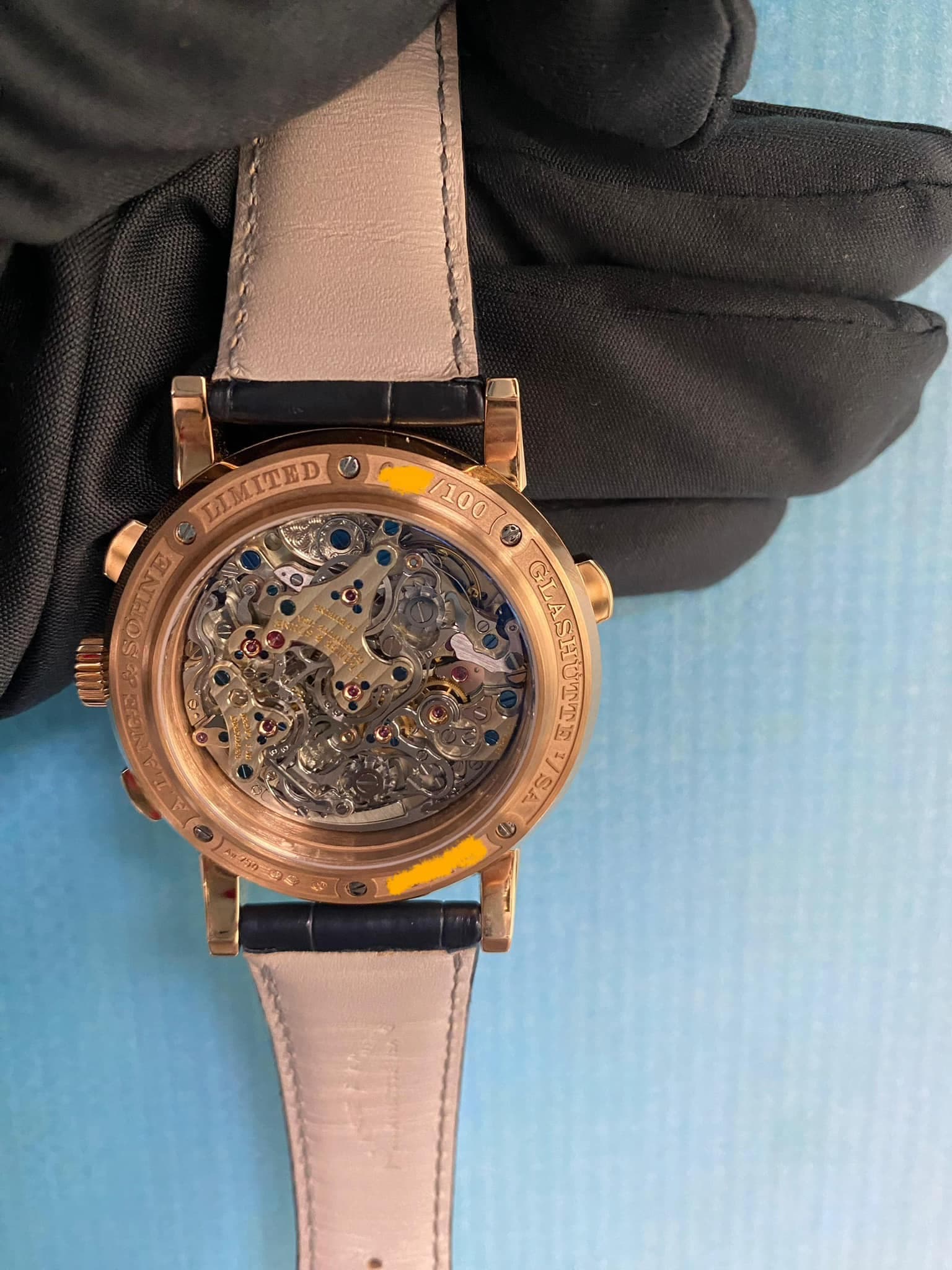 May be an image of wrist watch and text