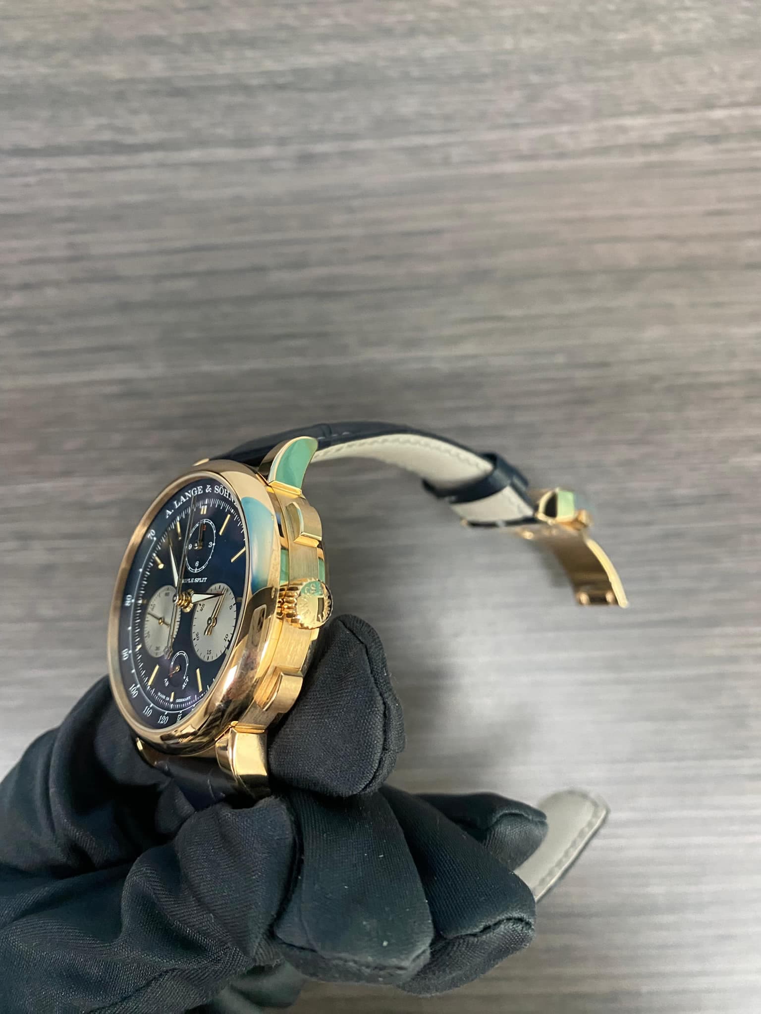 May be an image of wrist watch and text