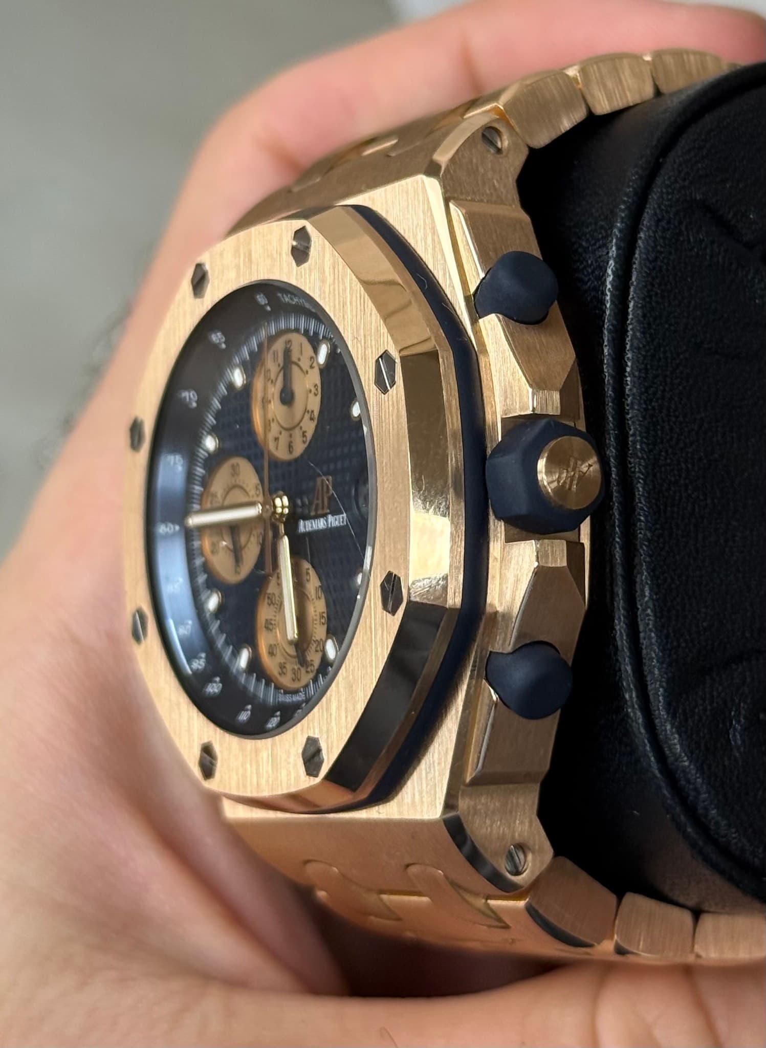 May be an image of wrist watch and text