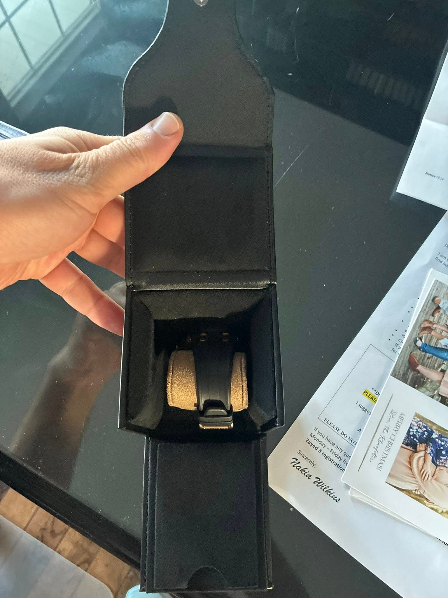 May be an image of wrist watch and ring