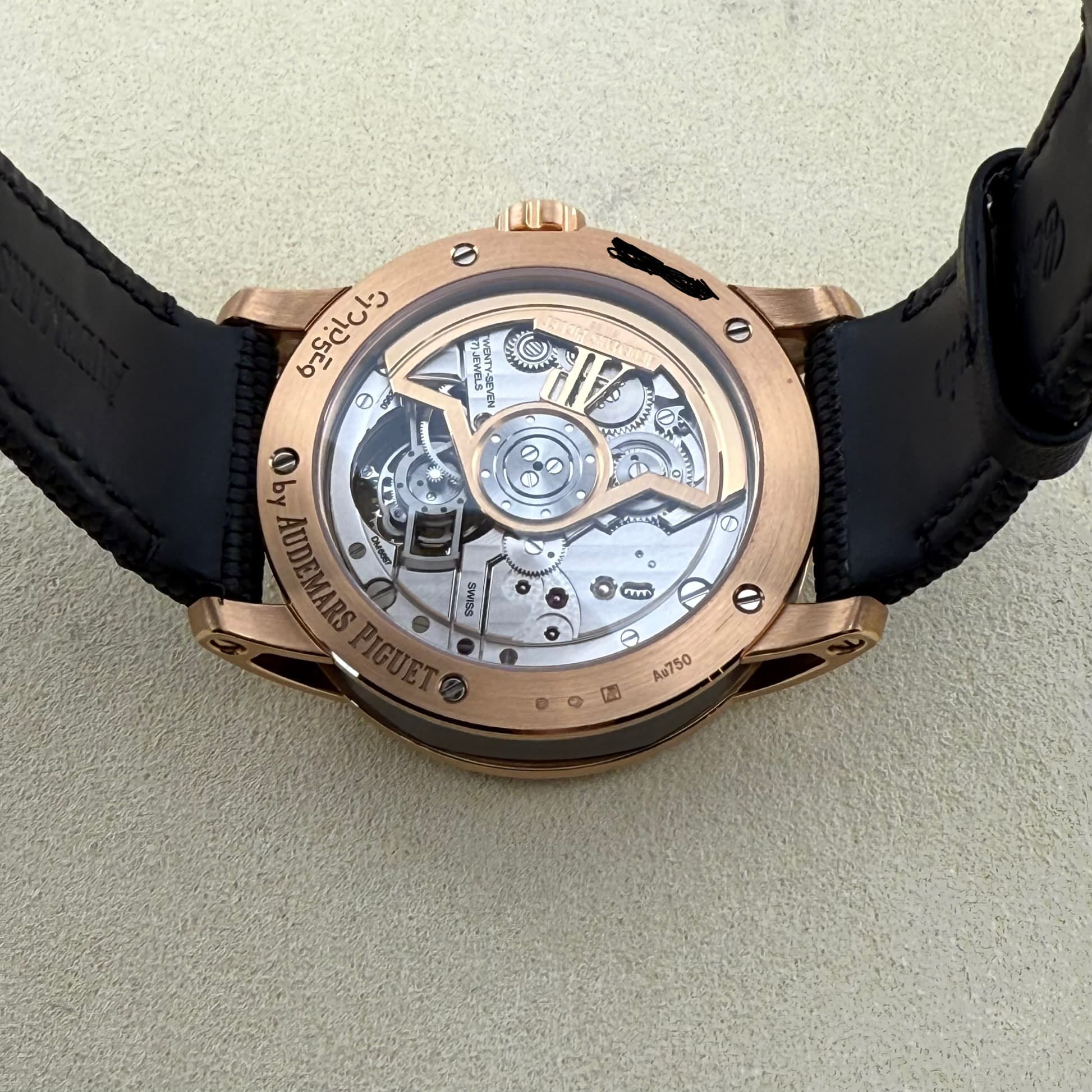 May be an image of wrist watch and text
