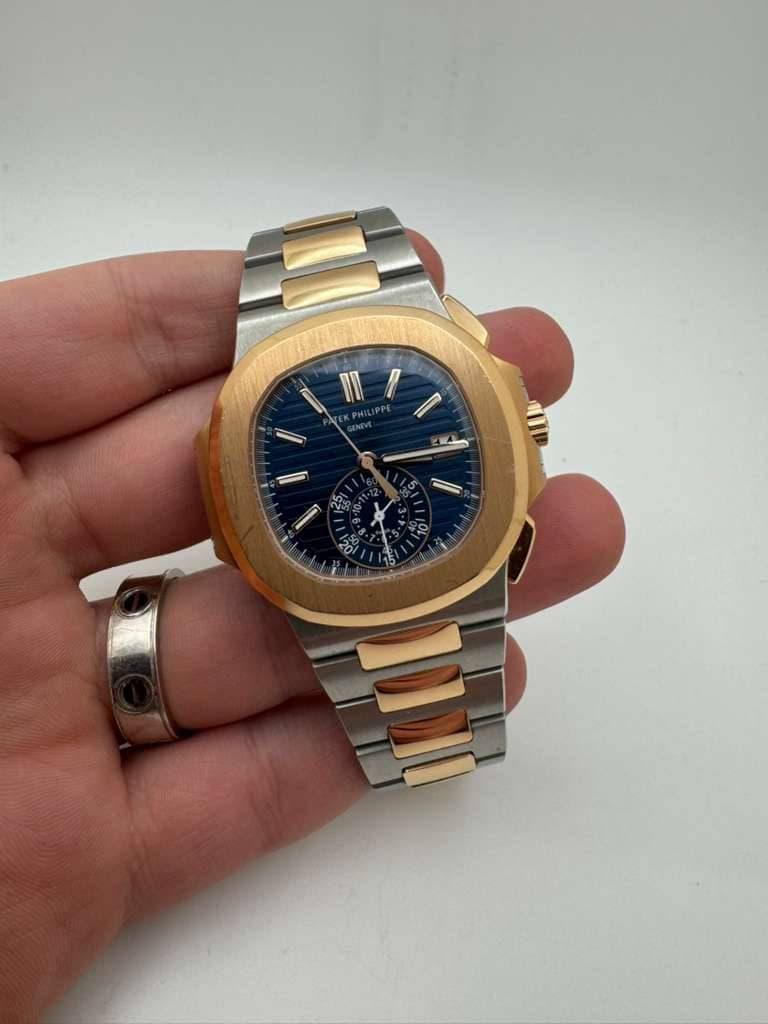 May be an image of wrist watch and text that says 'p II A'