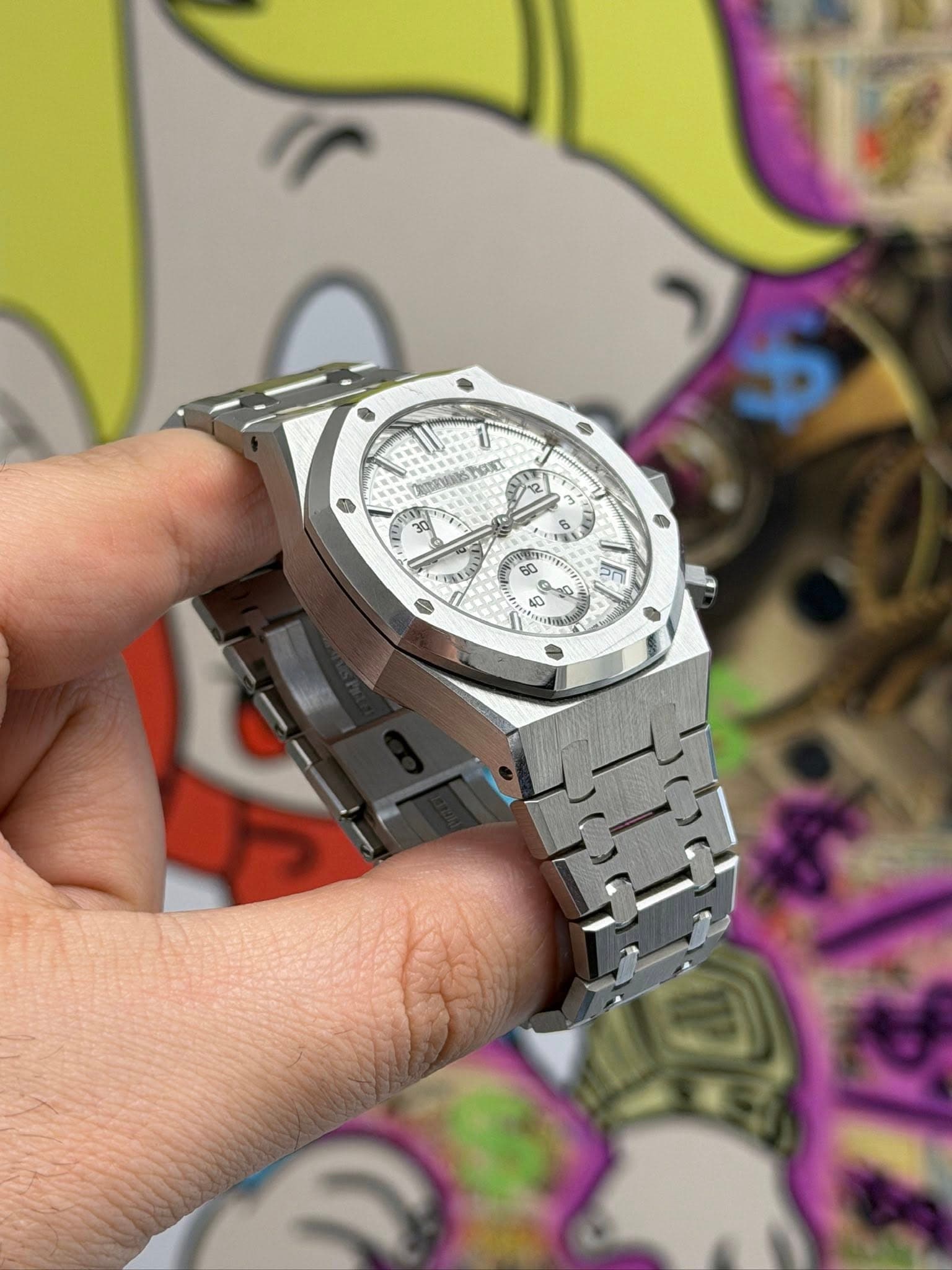 May be an image of wrist watch and text
