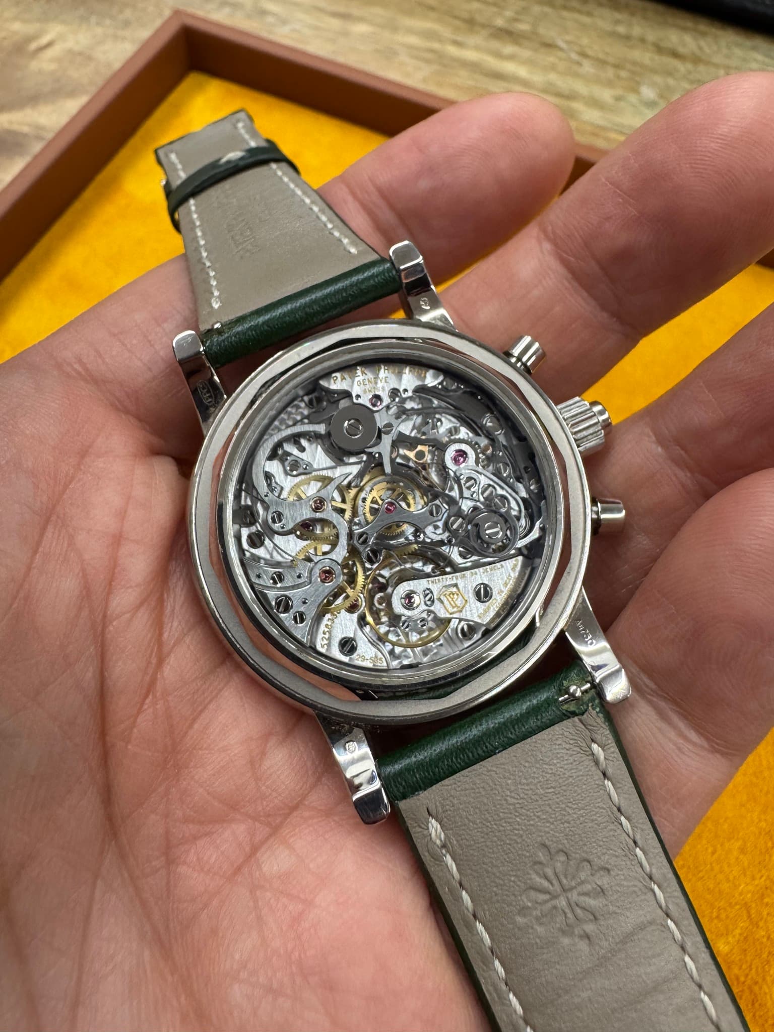 May be an image of wrist watch and text
