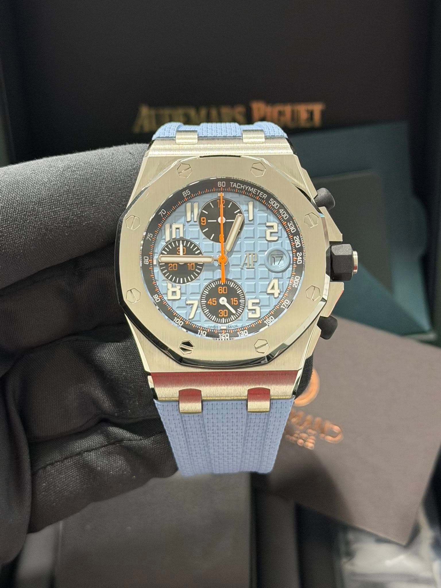 May be an image of wrist watch and text