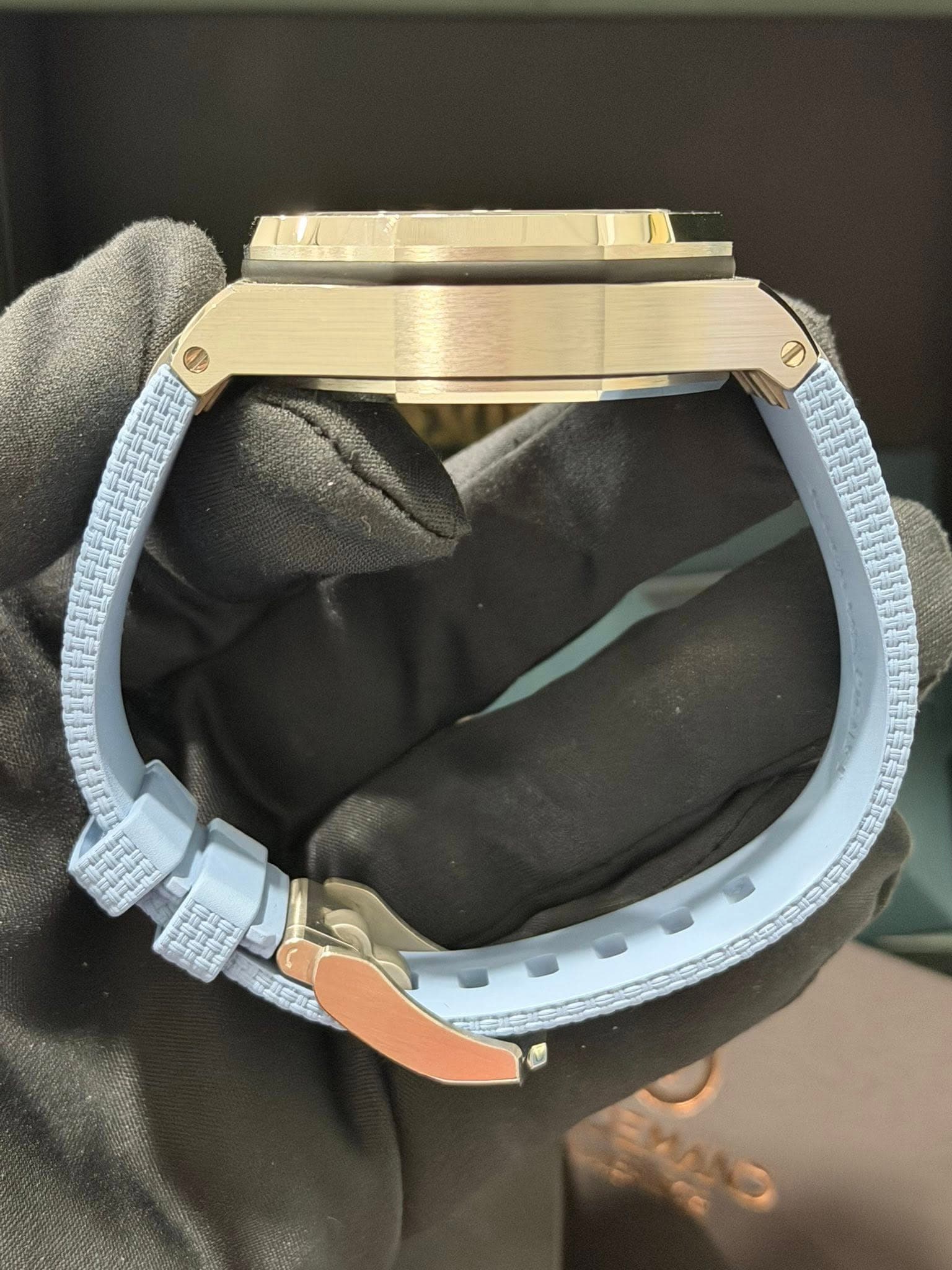 May be an image of wrist watch and text
