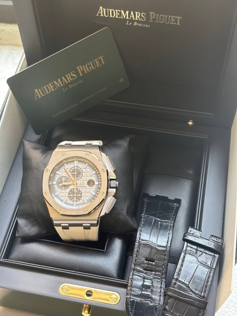 May be an image of wrist watch and text