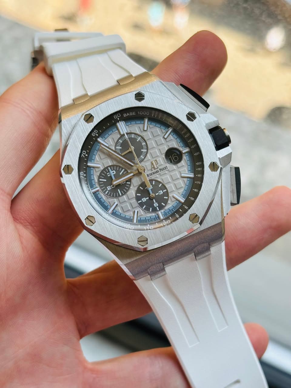 May be an image of wrist watch and text