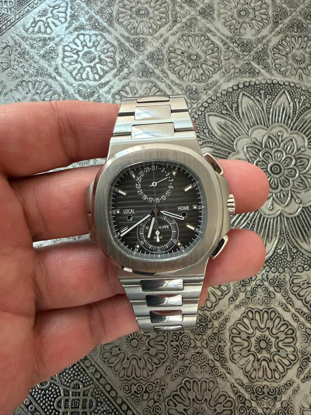 May be an image of wrist watch and text that says '3. in 25.2 M f وی 10 G-17 5. 3 LOCAL HOME ह s LIPPE O ከ BEETERE'