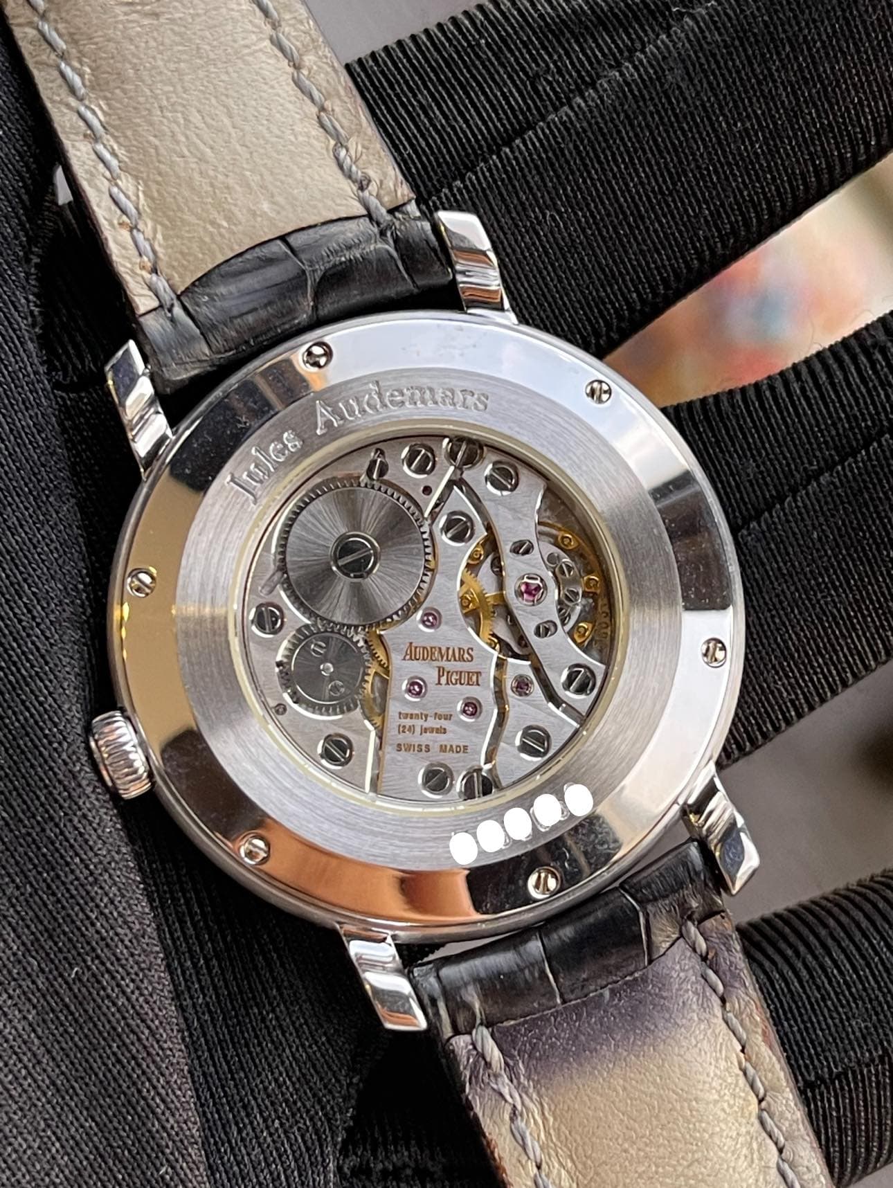 May be an image of wrist watch and text