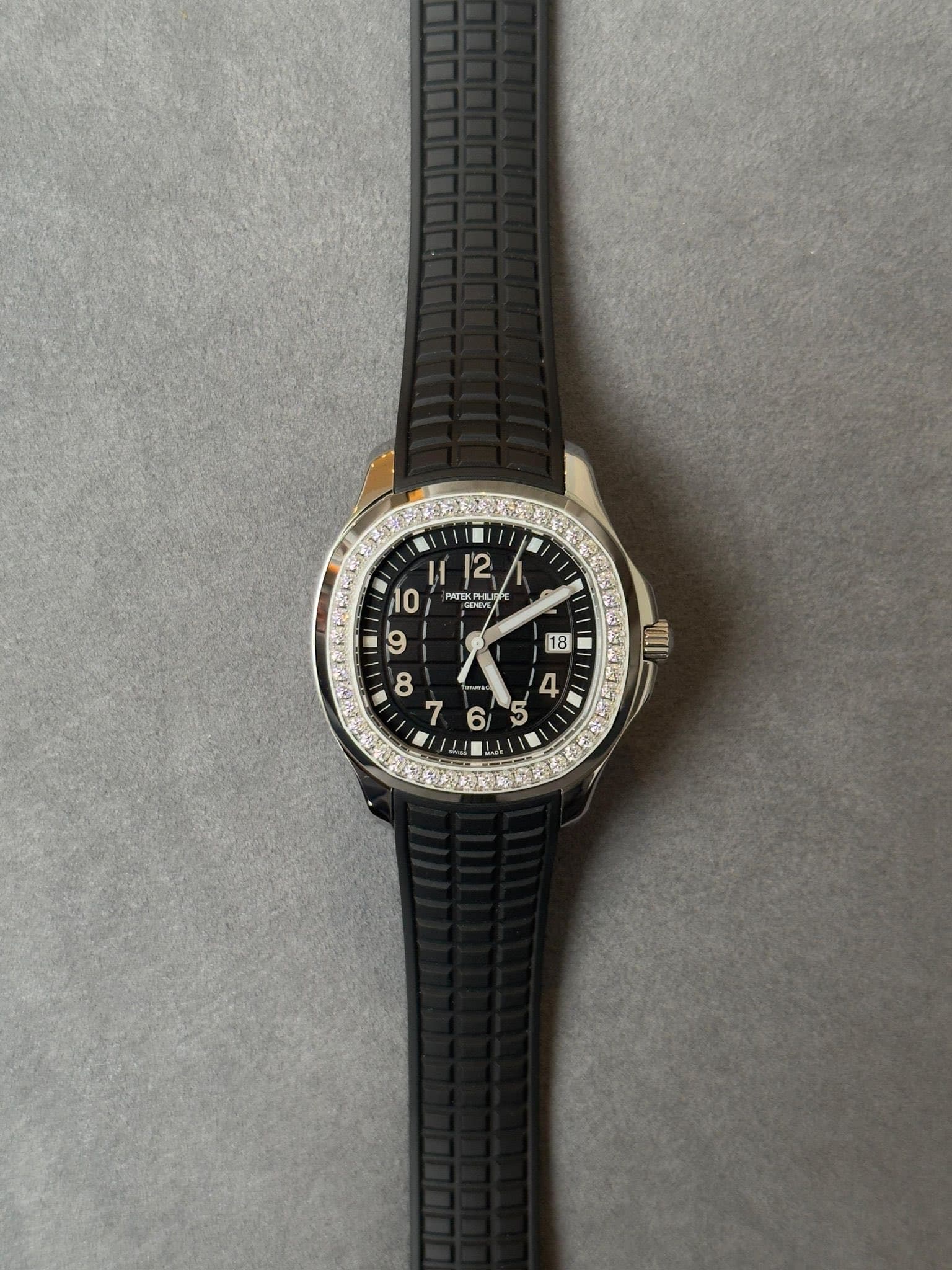 May be an image of wrist watch and text