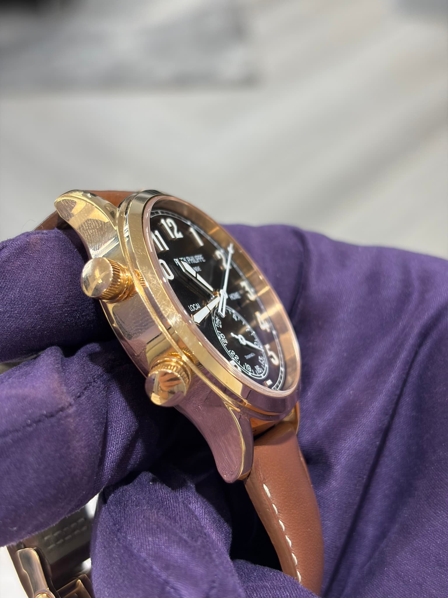 May be an image of wrist watch and text