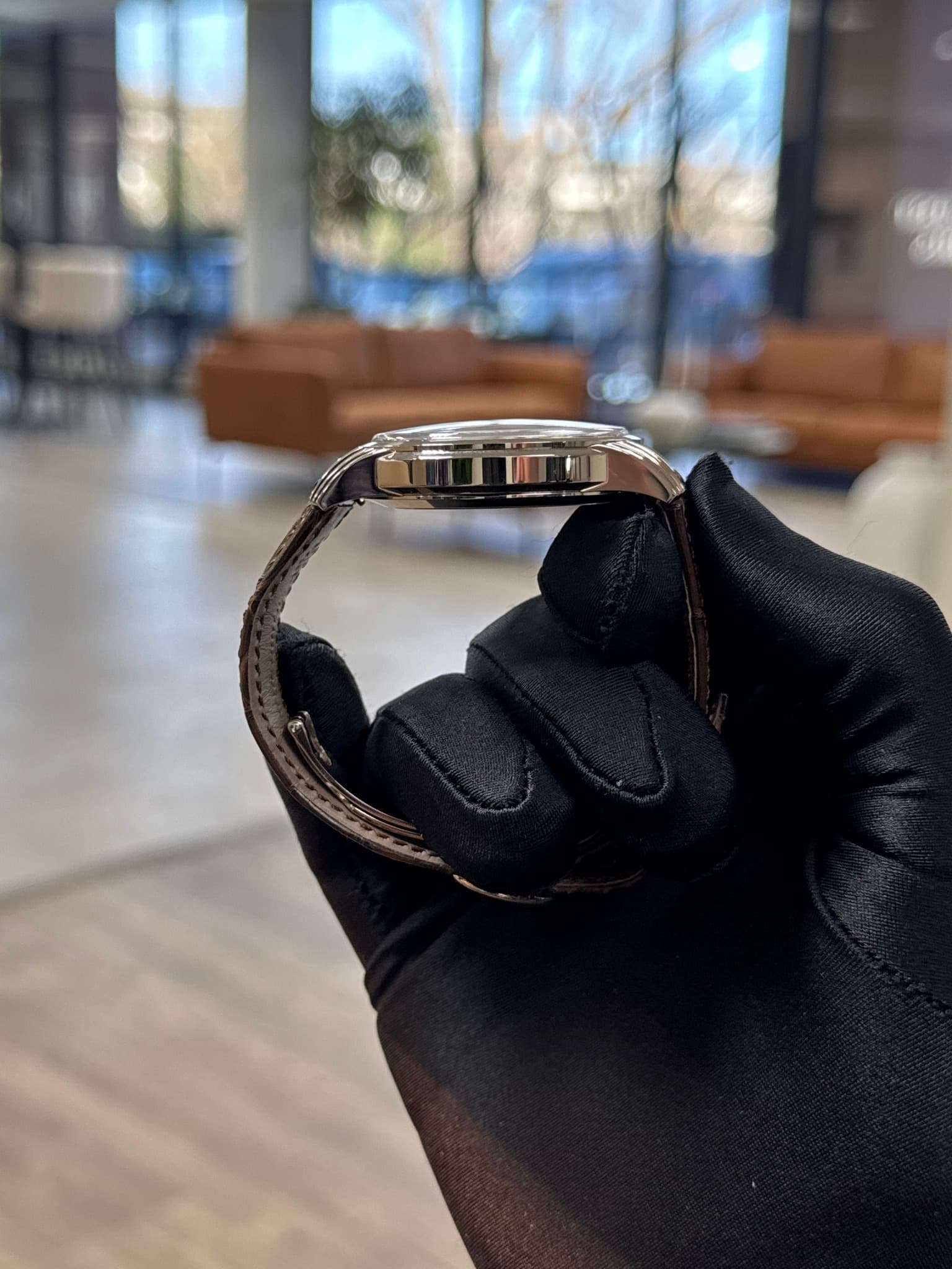 May be an image of leather and wrist watch