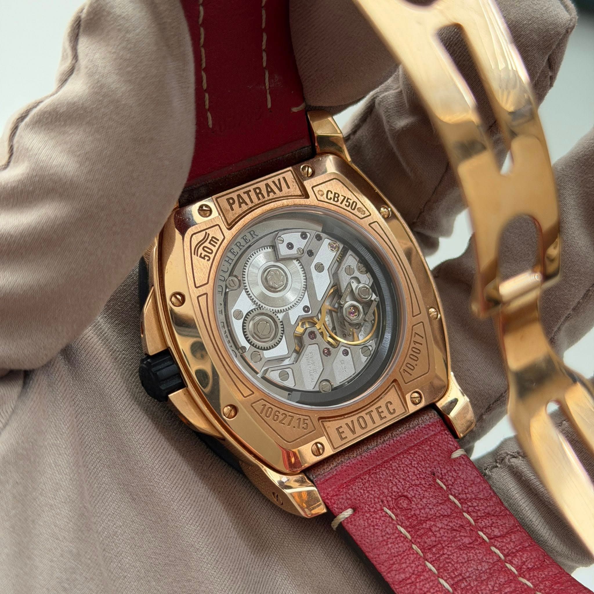 May be an image of wrist watch and text that says 'PATRAVI CB750 -CB7 CB750 M1 PATRAVI 50m EVOTEC EVOTEC D'