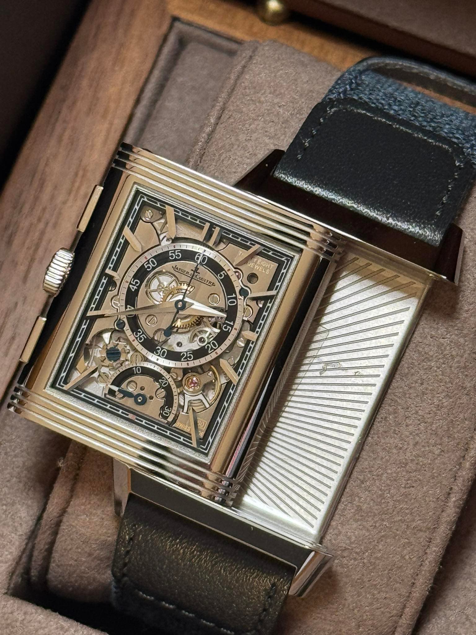 May be an image of wrist watch and text