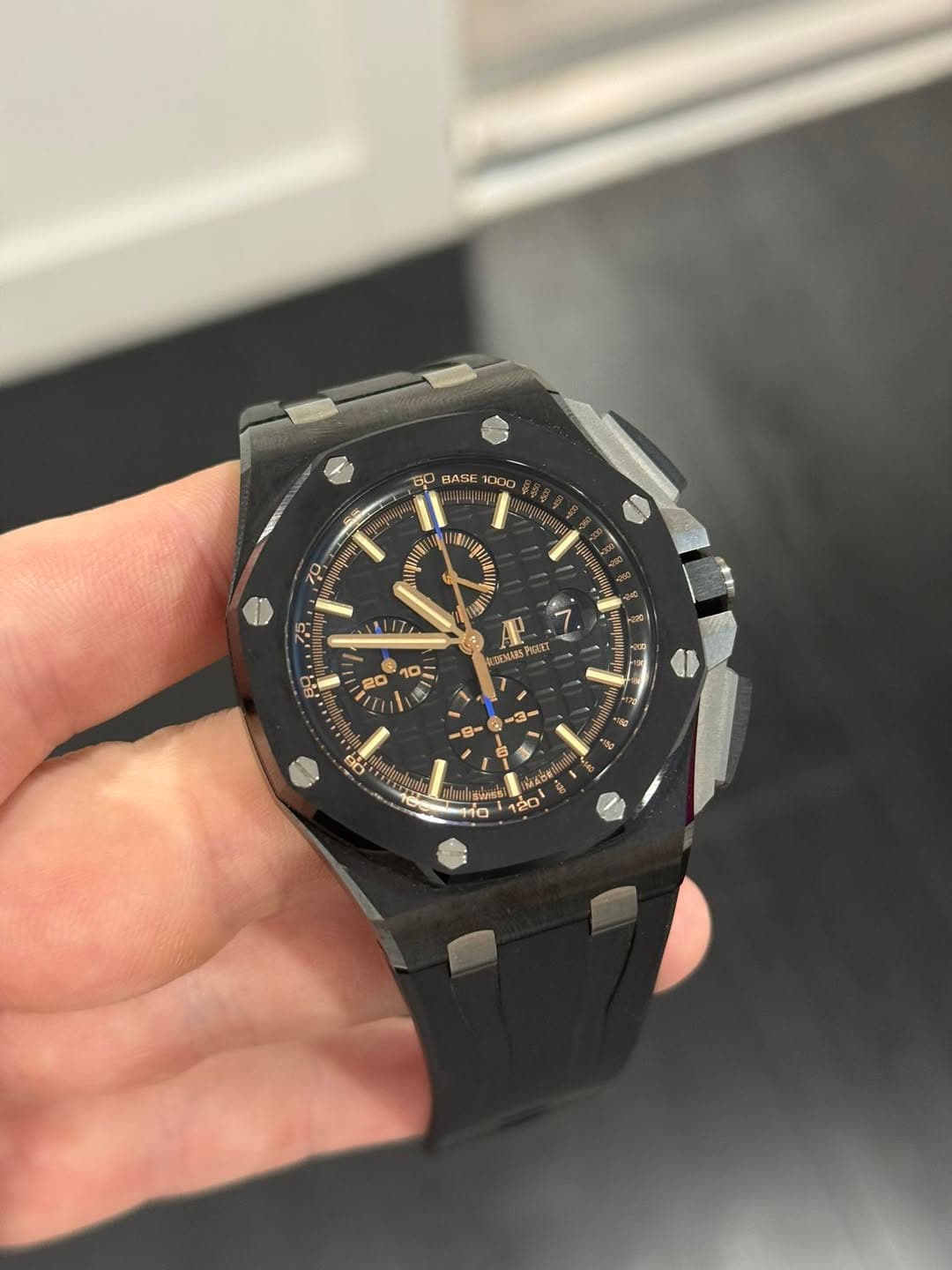 May be an image of wrist watch and text