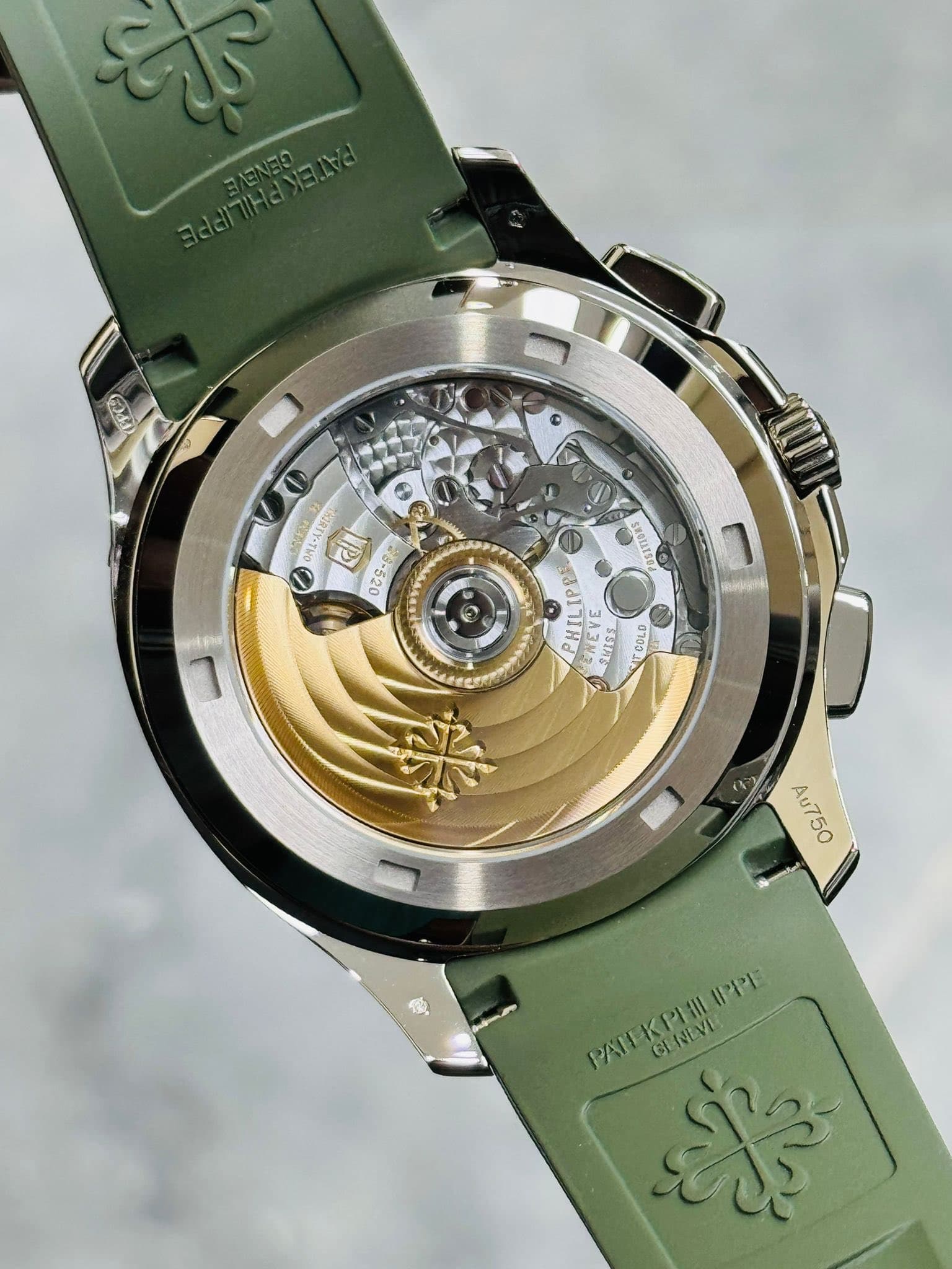 May be an image of wrist watch and text