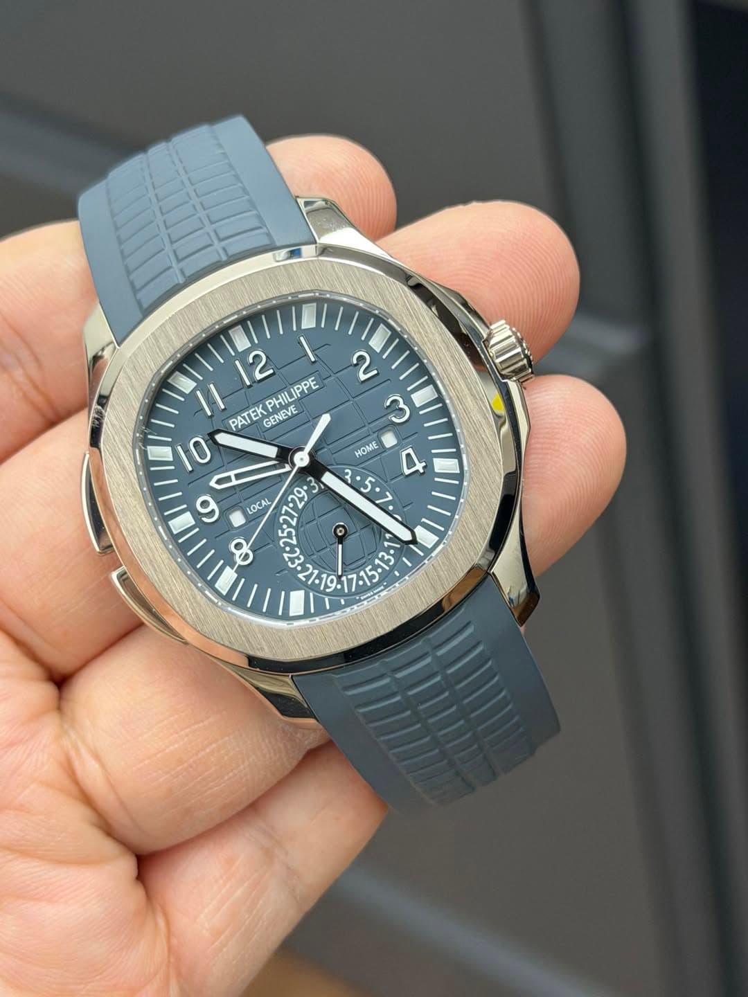 May be an image of wrist watch and text that says '12 PHIL ILIPPE 2 11 PATEK GENEVE ٢ 0 HOME بو ک ی 6 LOCAL 27-29.3 E. •29 o O ب E'