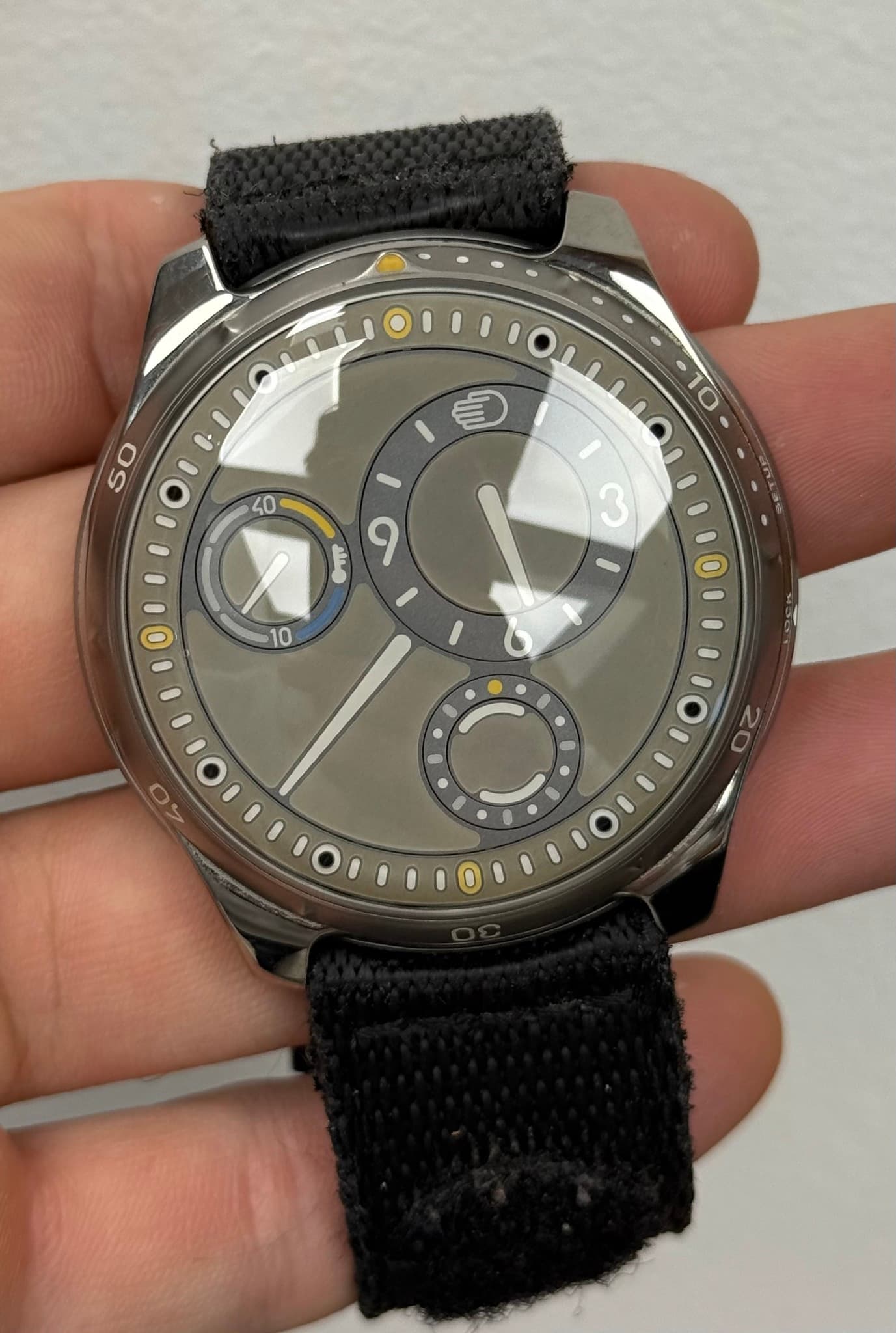 May be an image of wrist watch