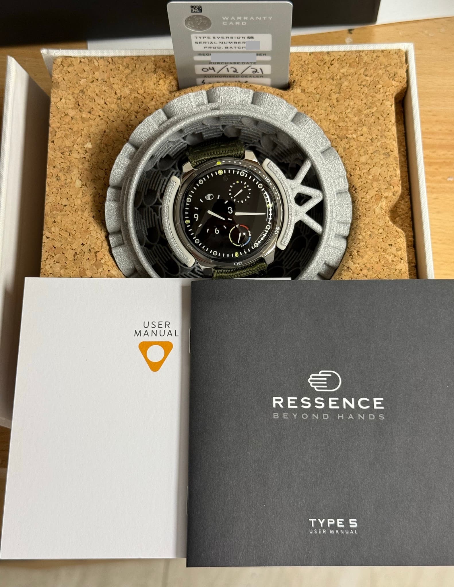 May be an image of digital watch and text that says 'CARDN TYPEAVERSION50 AVERSION50 PROS BATCH OI 0 Ối 110, 0 セスミ 20 3 3 9 b ማ יפיי יח D0 USER MANUAL RESSENCE BEYONDHANDS…