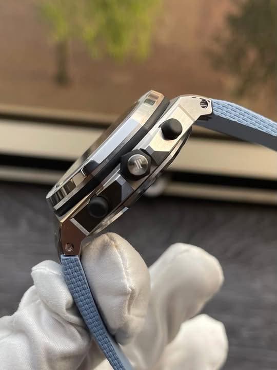 May be an image of wrist watch and text