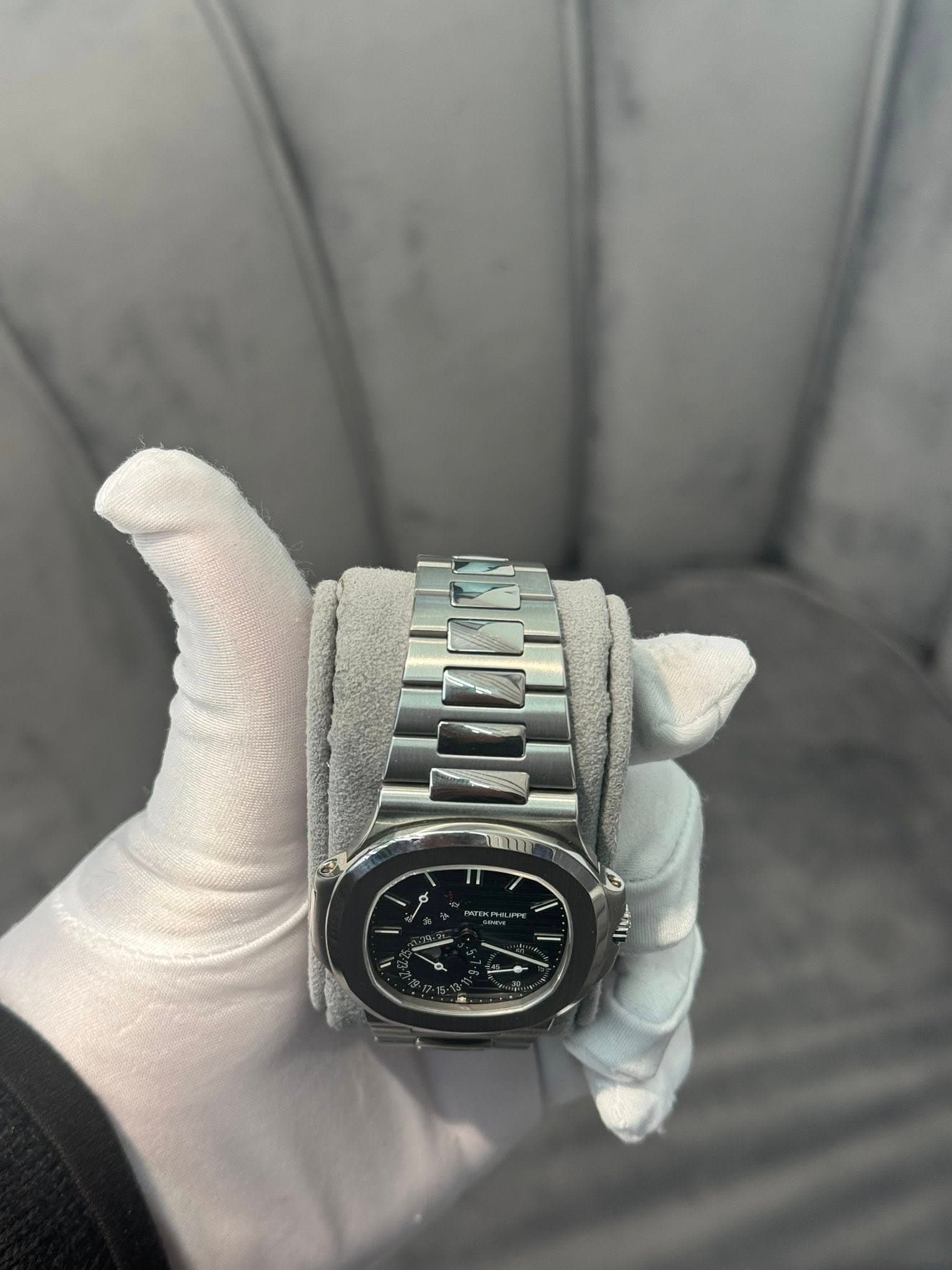 May be an image of wrist watch and text