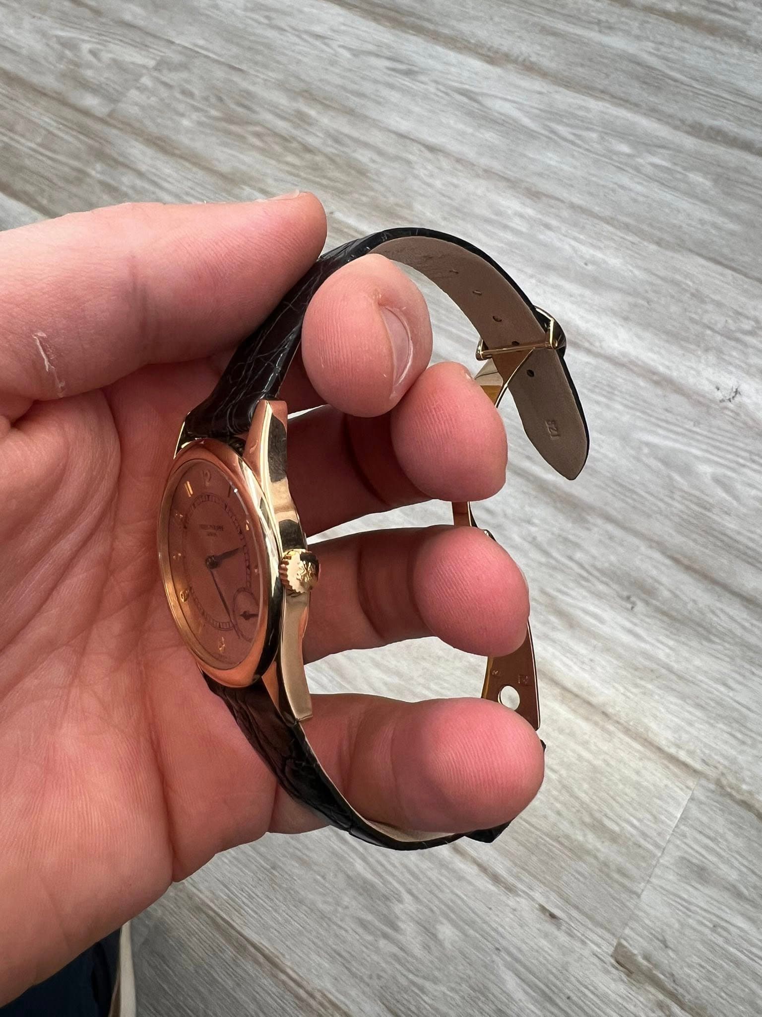 May be an image of wrist watch