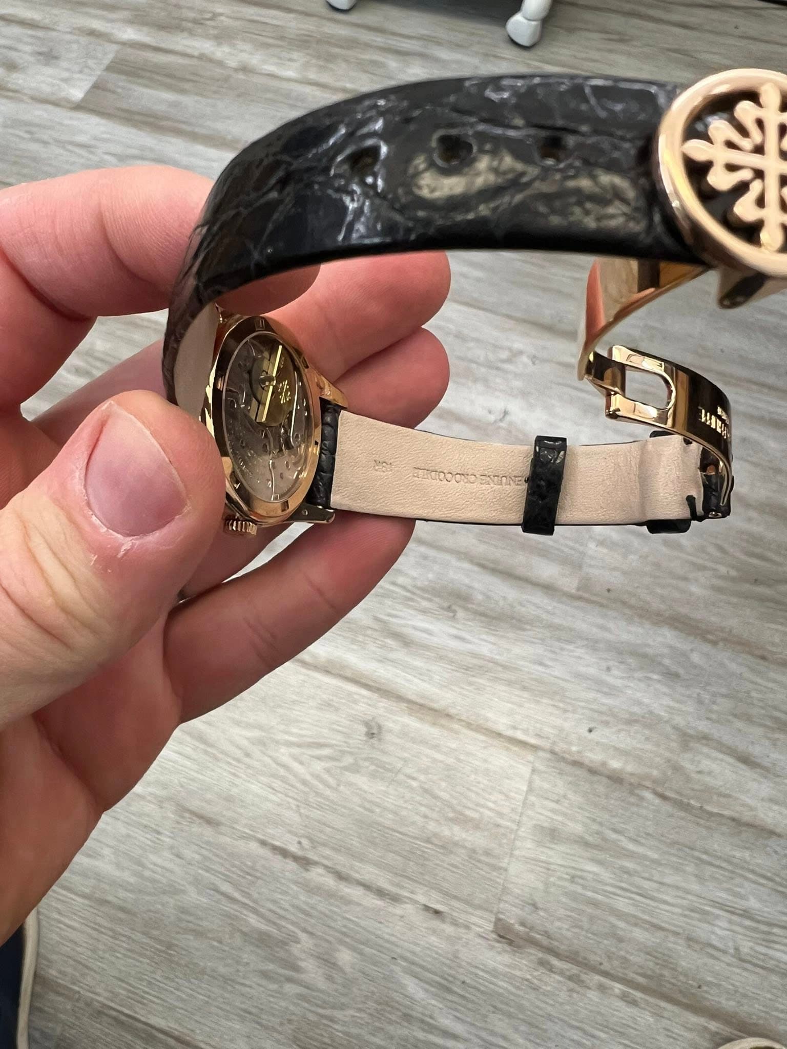 May be an image of wrist watch
