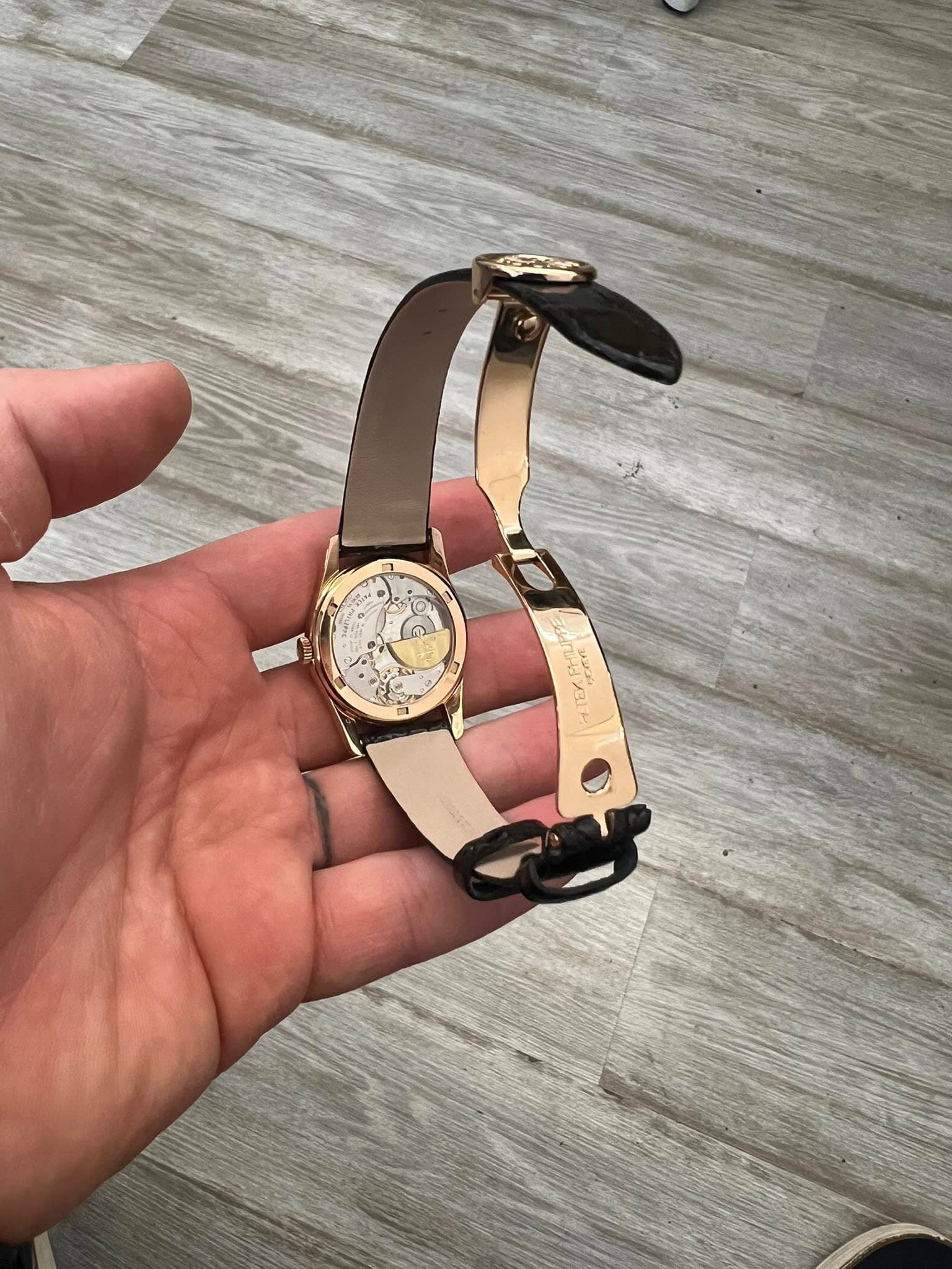 May be an image of wrist watch