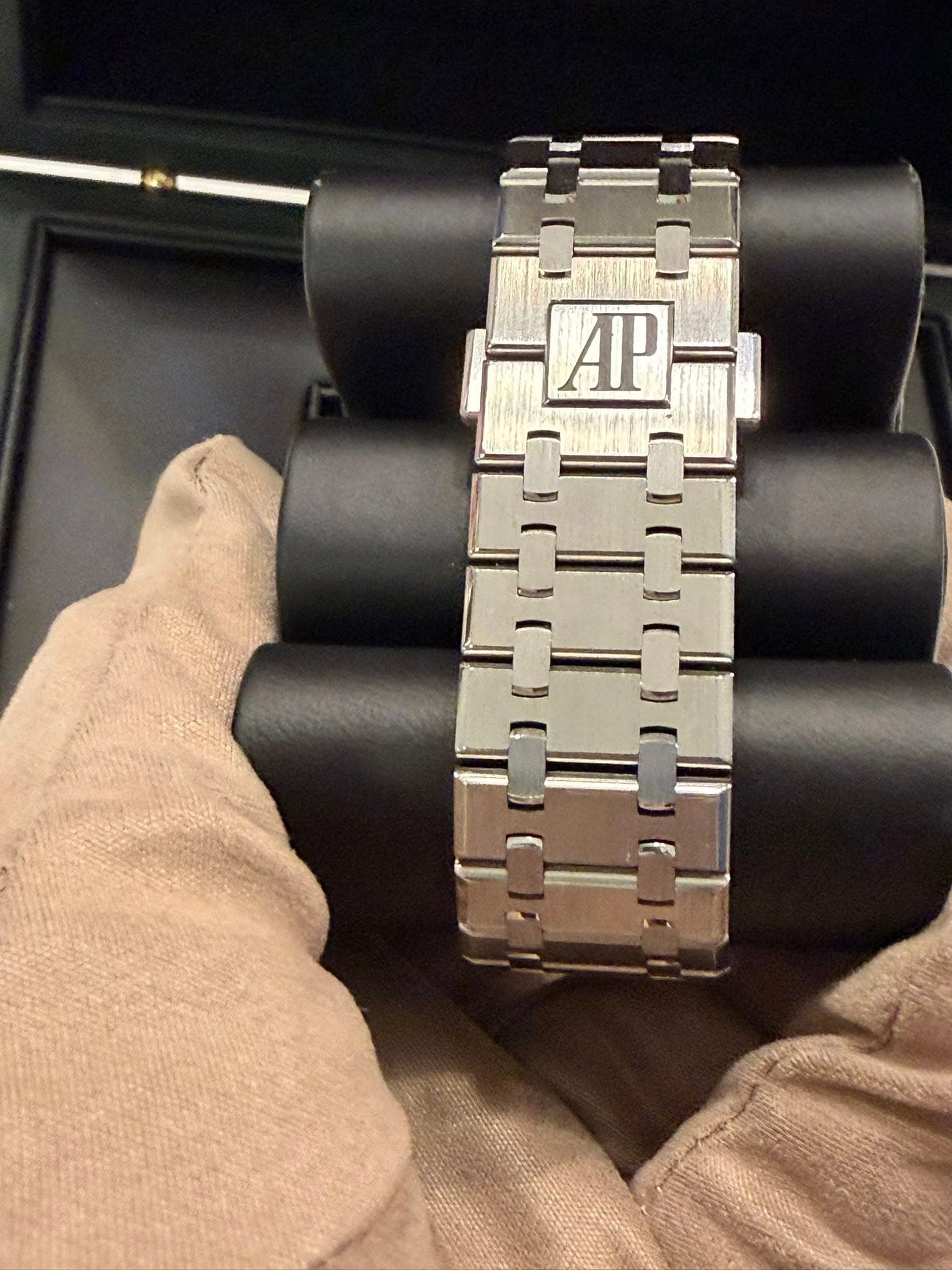 May be an image of wrist watch and text