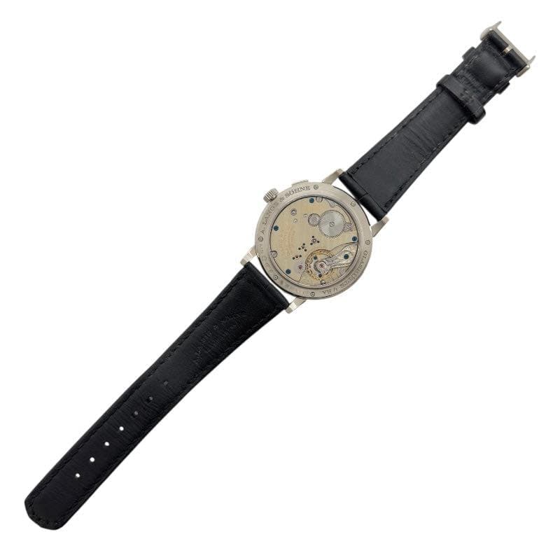May be an image of pocketwatch, strap and timer