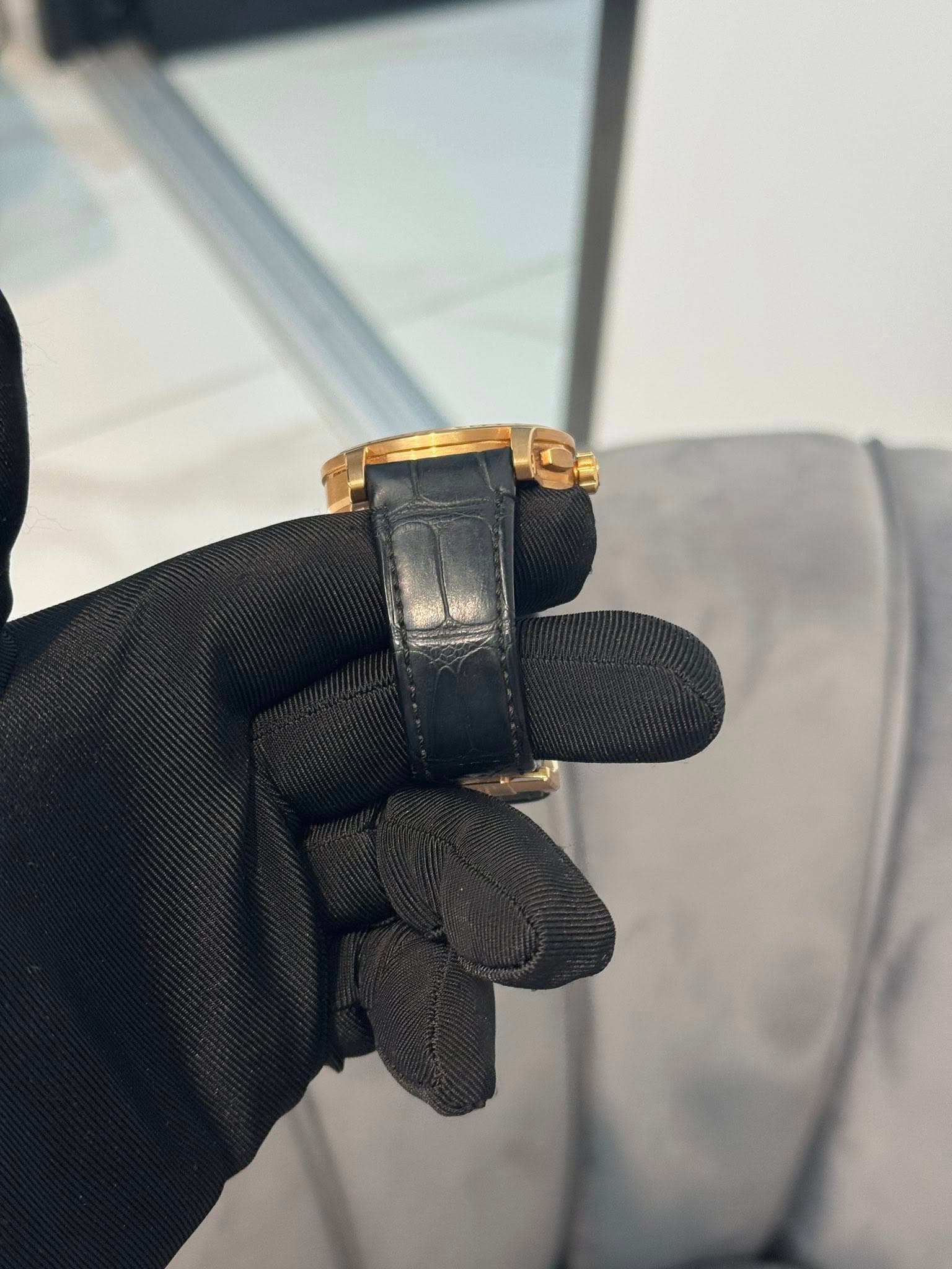 May be an image of wrist watch and leather