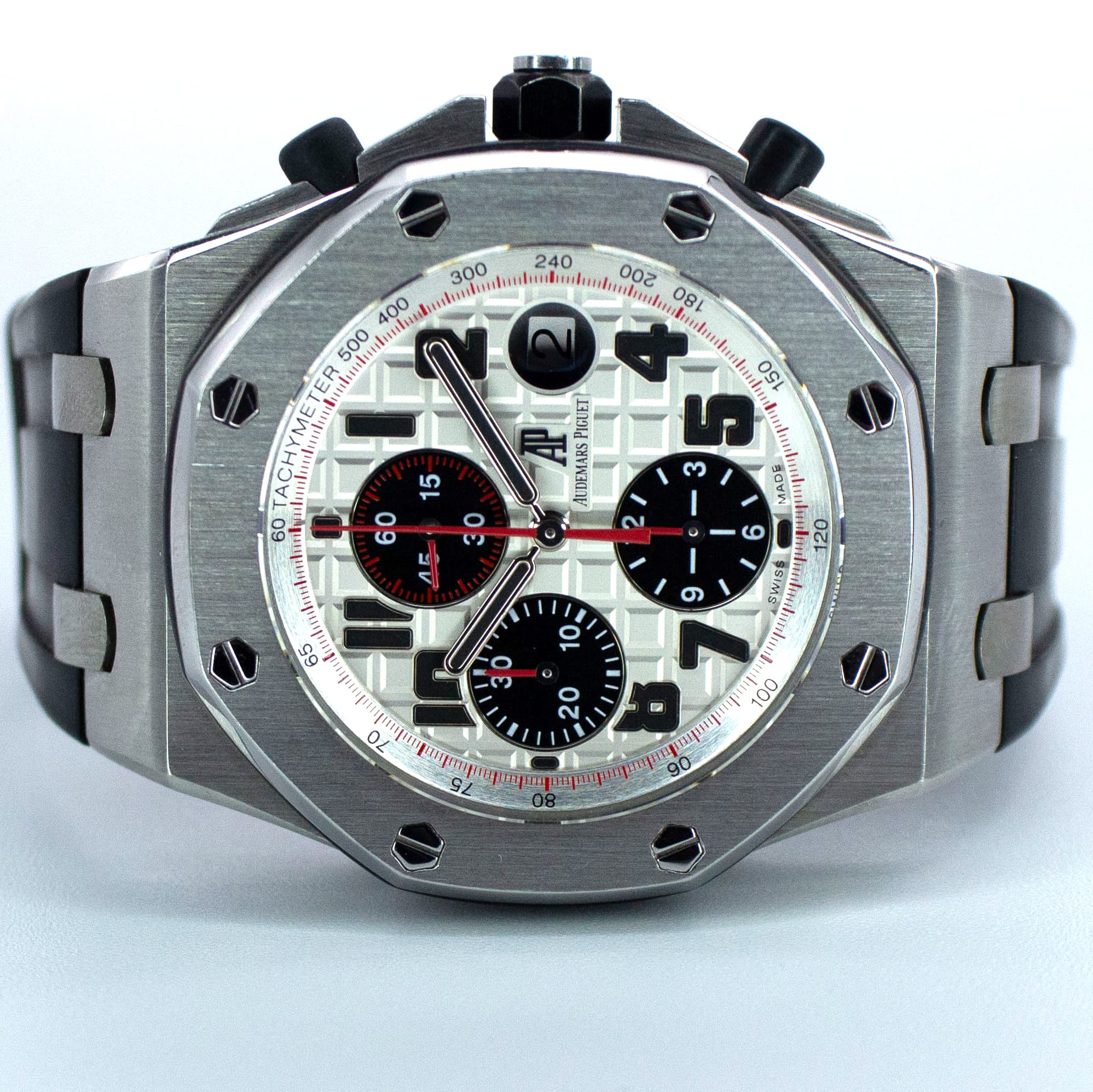 May be an image of wrist watch and text