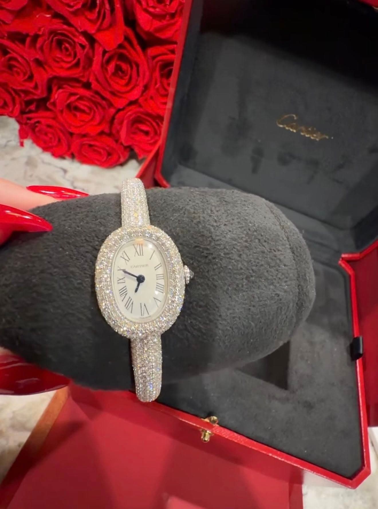 May be an image of wrist watch and text