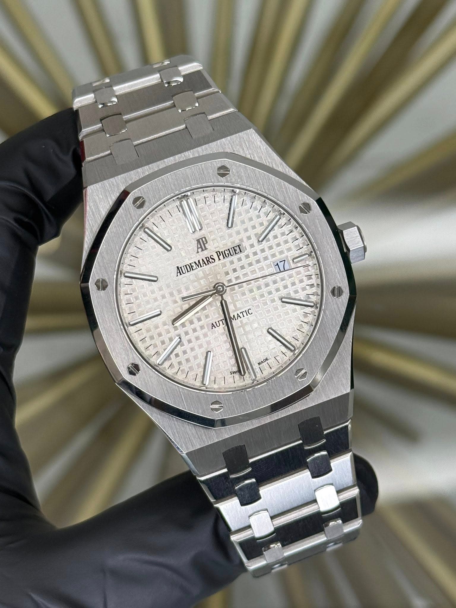 May be an image of wrist watch and text