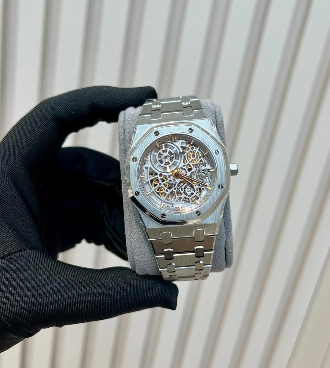 May be an image of wrist watch and text