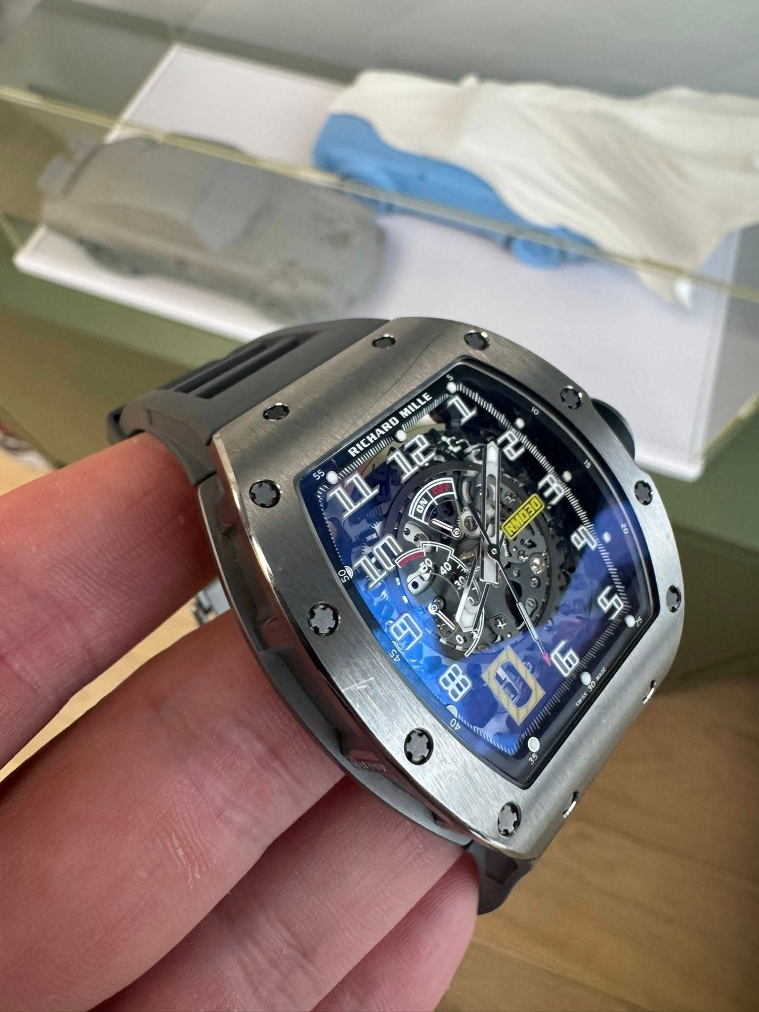 May be an image of wrist watch and text