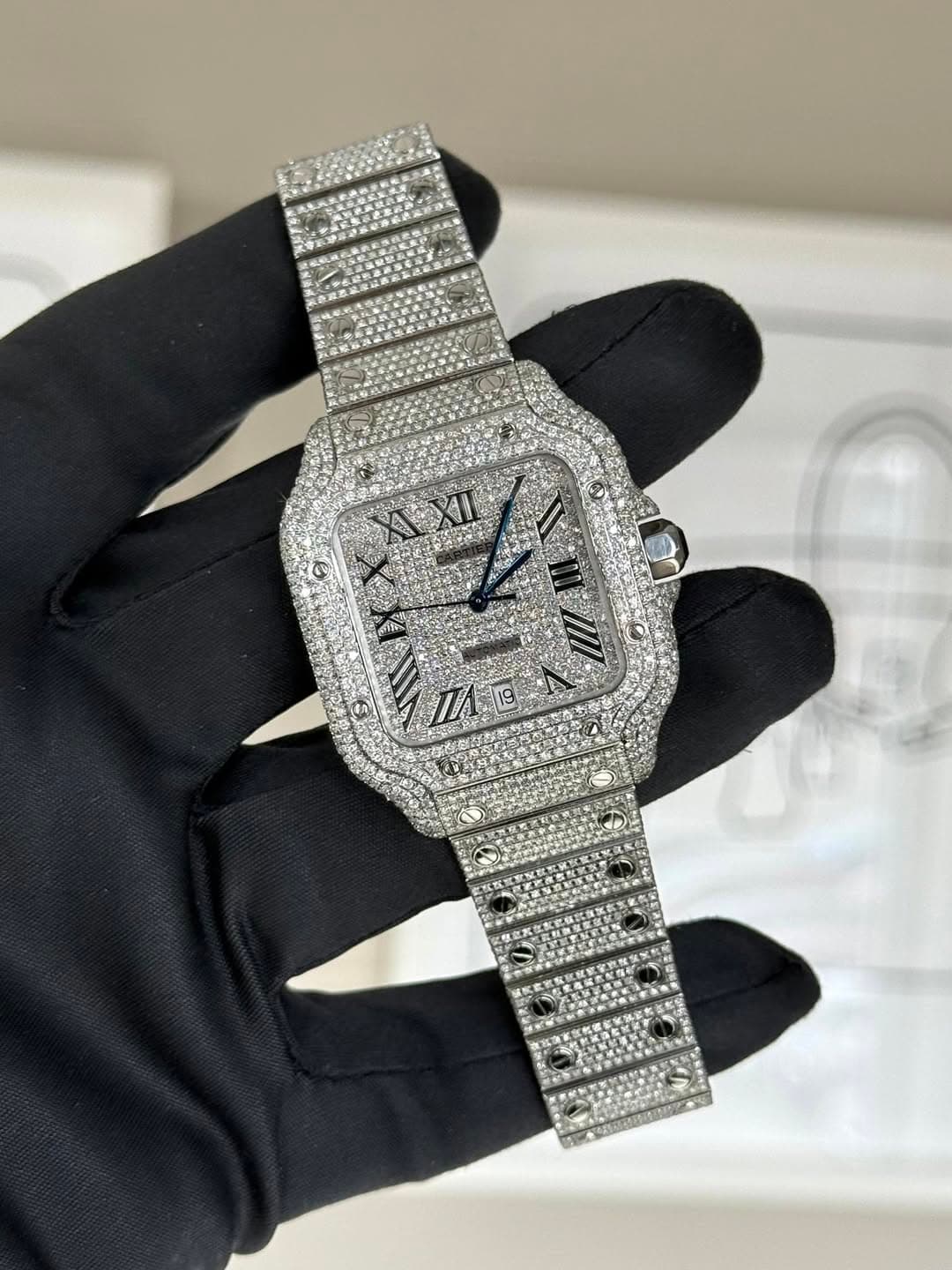 May be an image of wrist watch and text