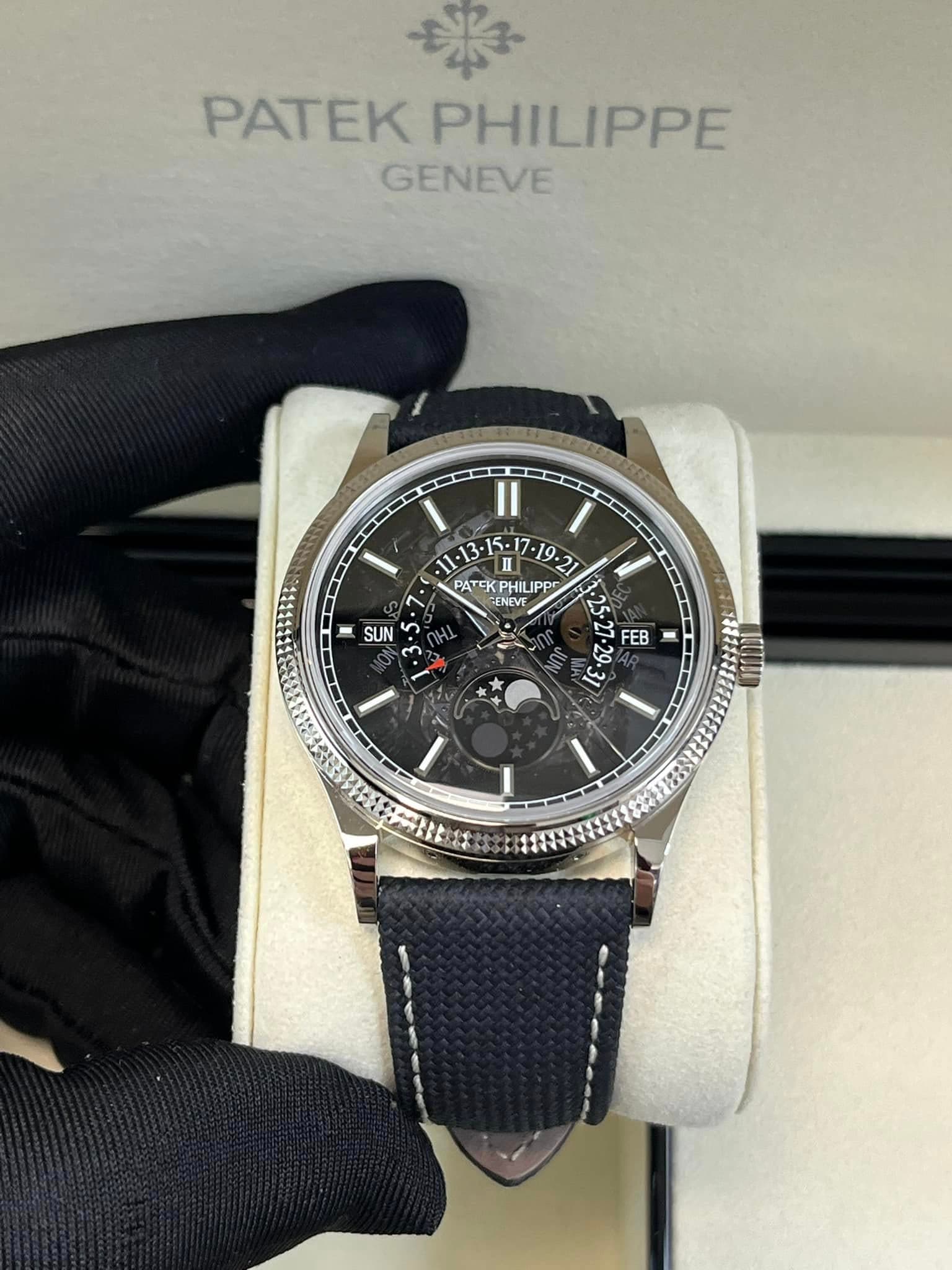 May be an image of wrist watch and text that says '業 PATEK PHILIPPE GENEVE I Il PATEKP PHIL ATCKPHILIPP Jppr GENE GENEVF PATKPHILIPP ENC ب 20 FEB שי SUN 5 3국33이원 大'