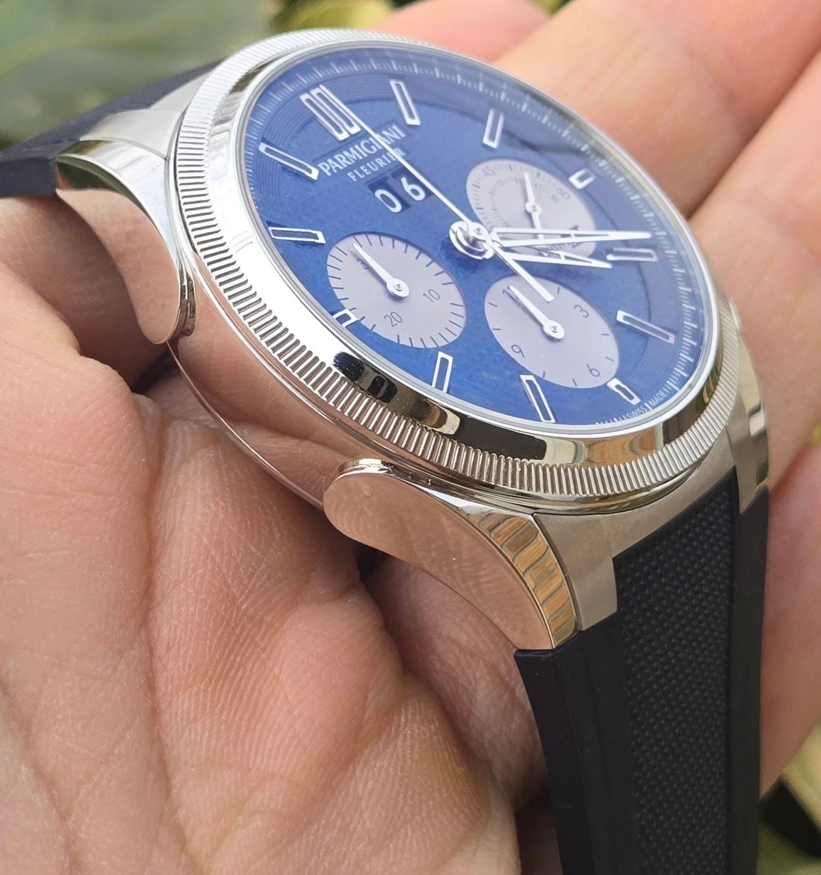 May be an image of wrist watch and text that says 'DU I PARMIGI NI LEURI O 6 لا M 6O $ To 20 S a ۱ I O o'