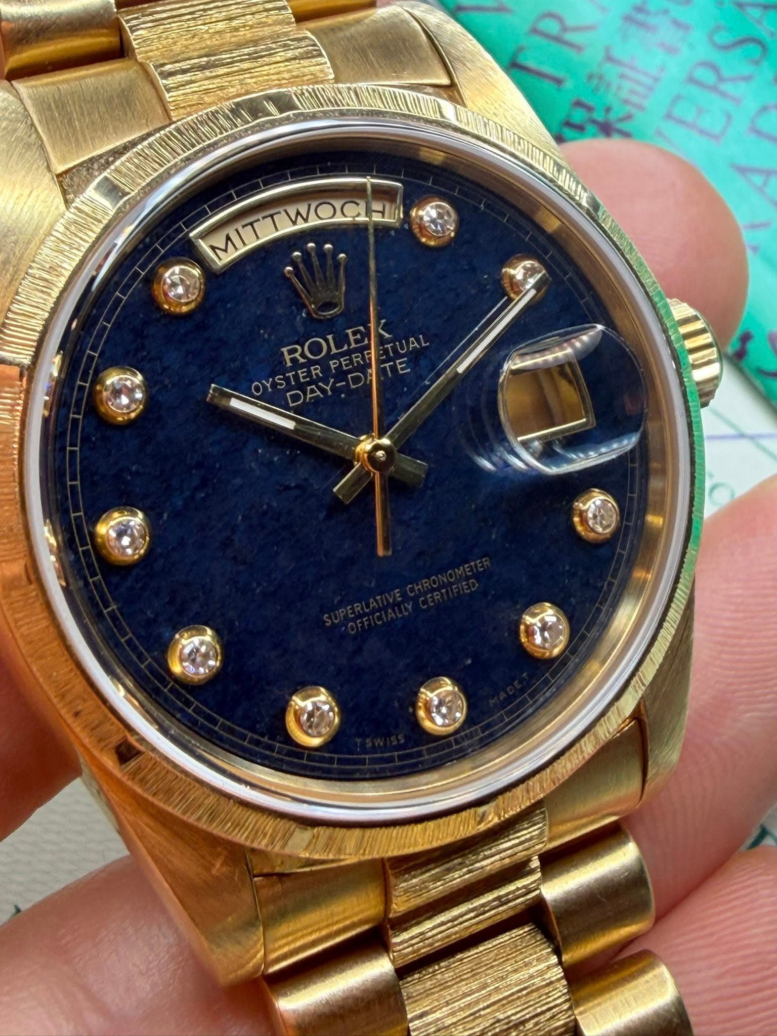May be an image of wrist watch and text