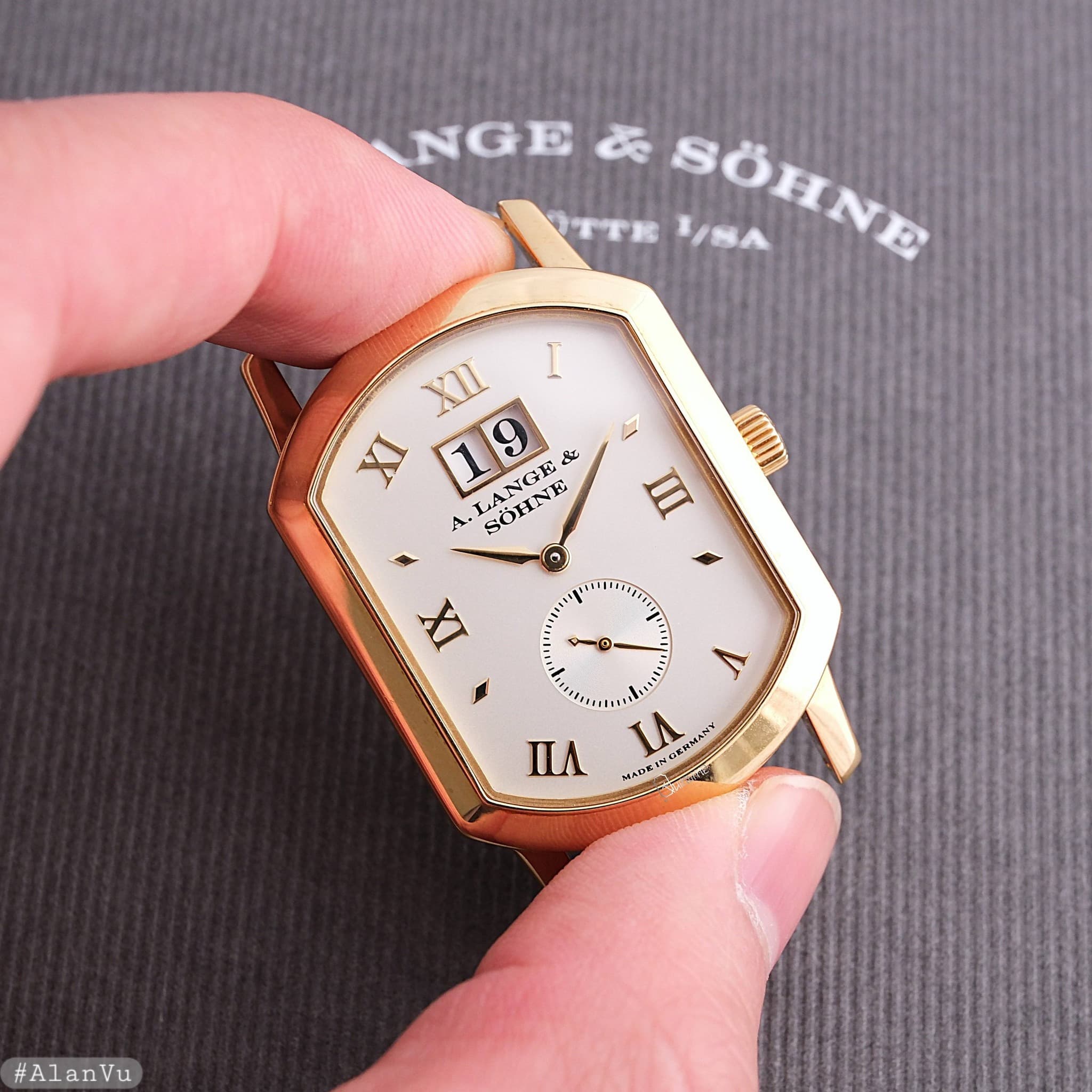 May be an image of wrist watch and text