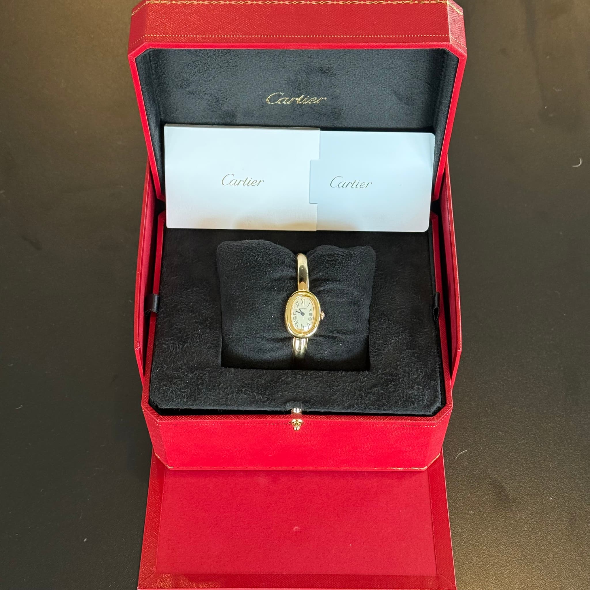 May be an image of ring, wrist watch and text
