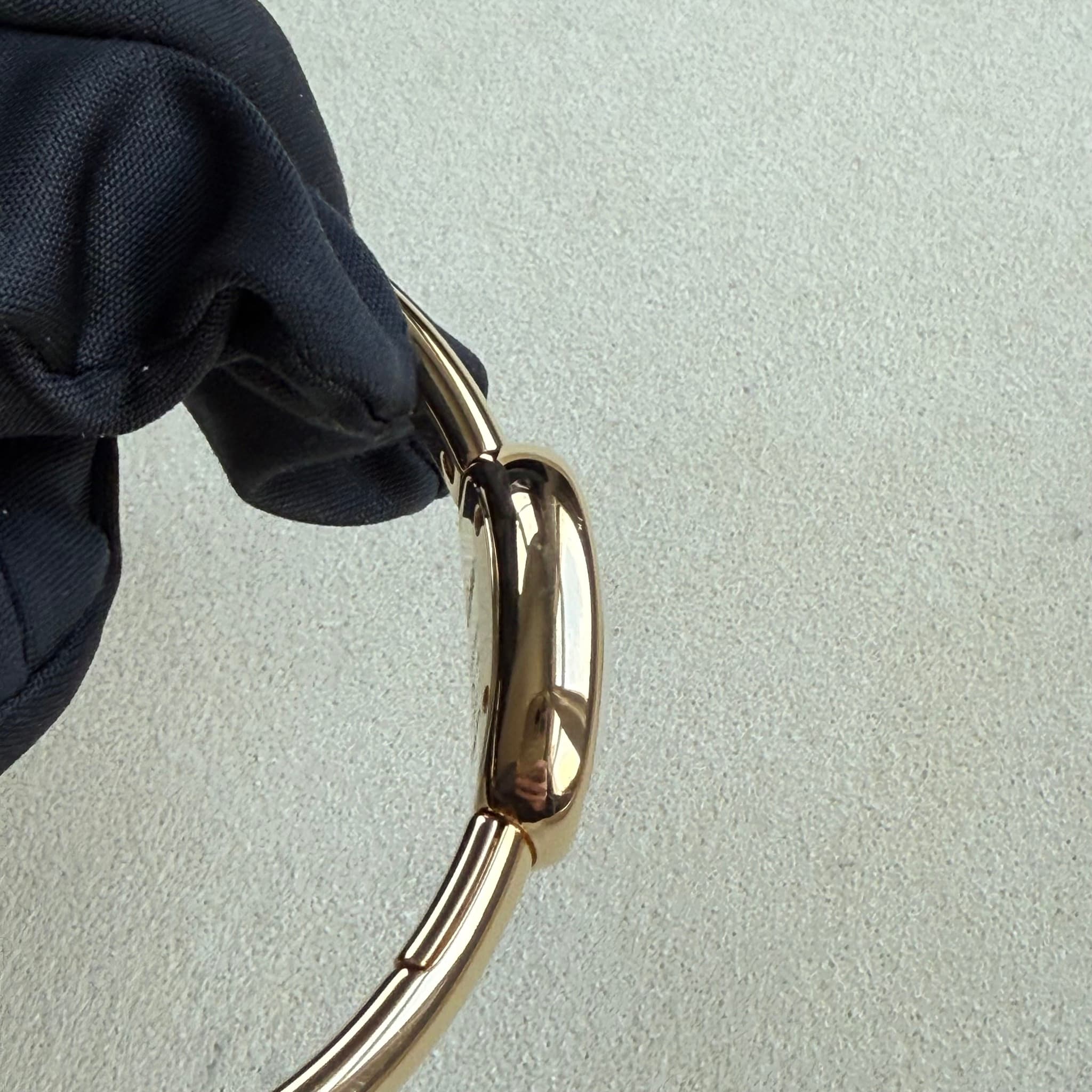 May be an image of saddle-stitched leather