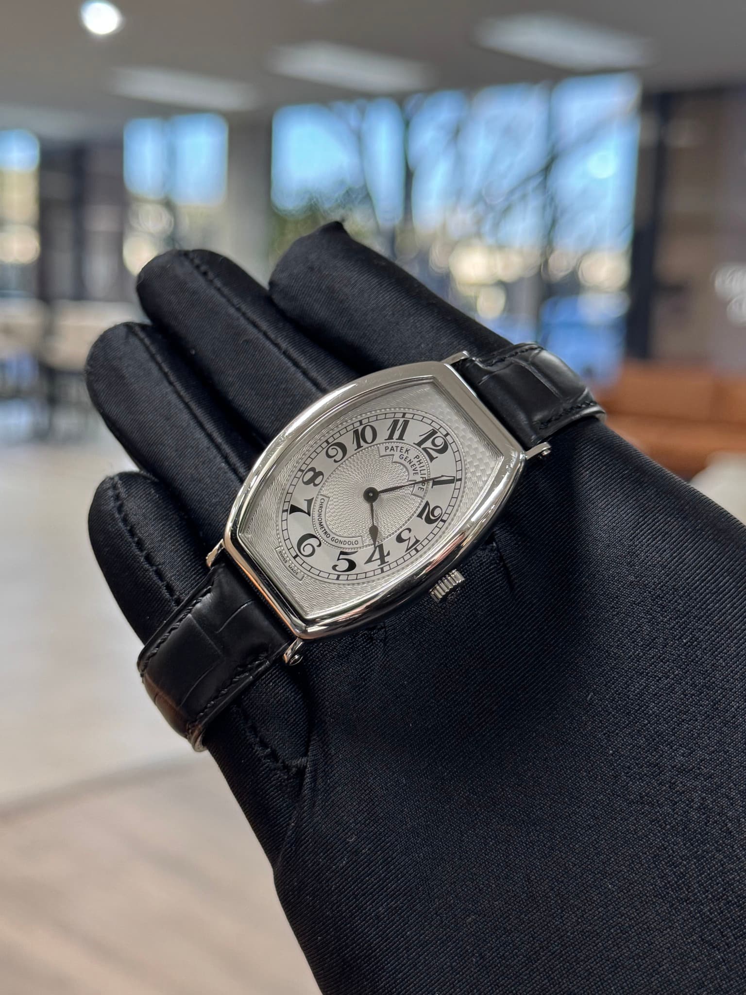 May be an image of wrist watch and text
