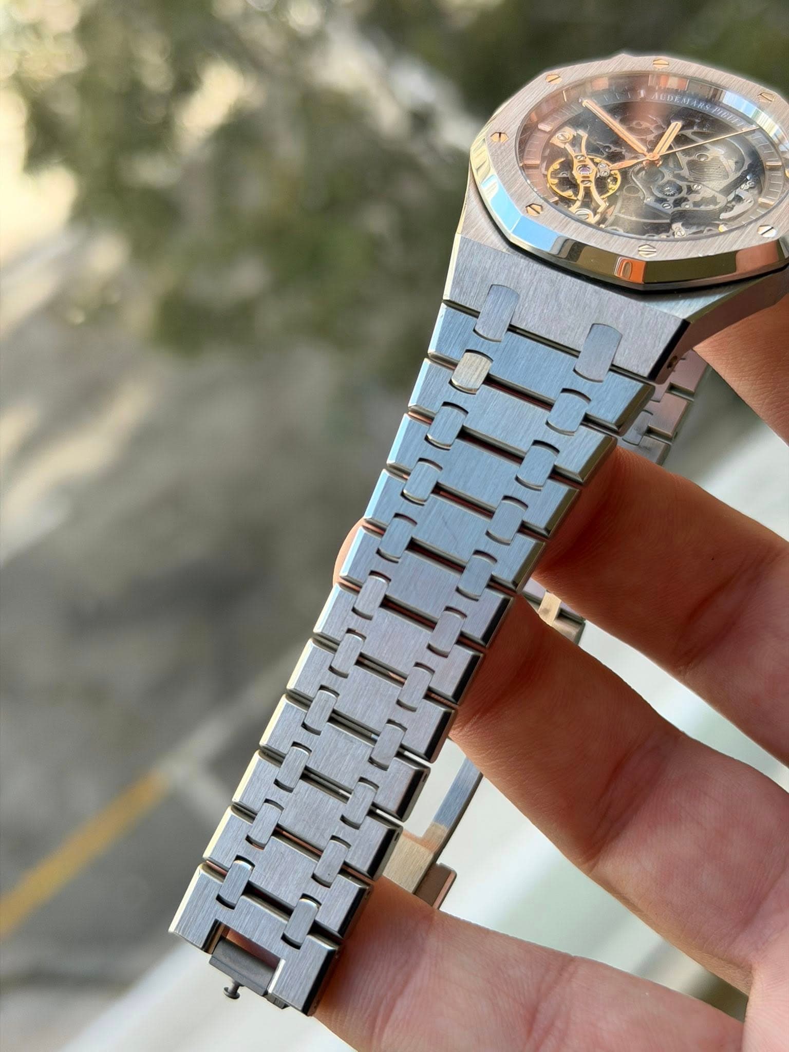 May be an image of wrist watch and text