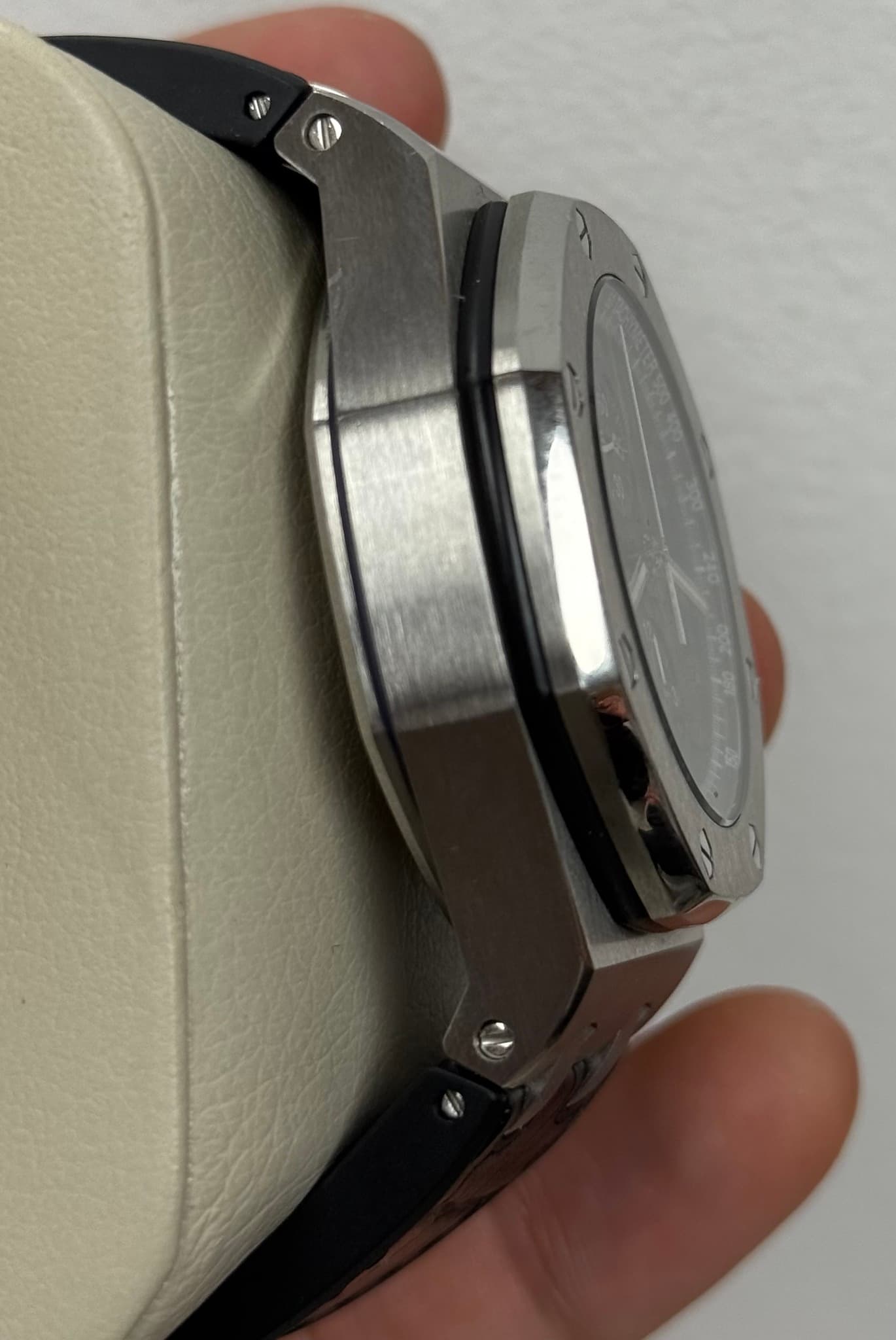 May be an image of wrist watch and text