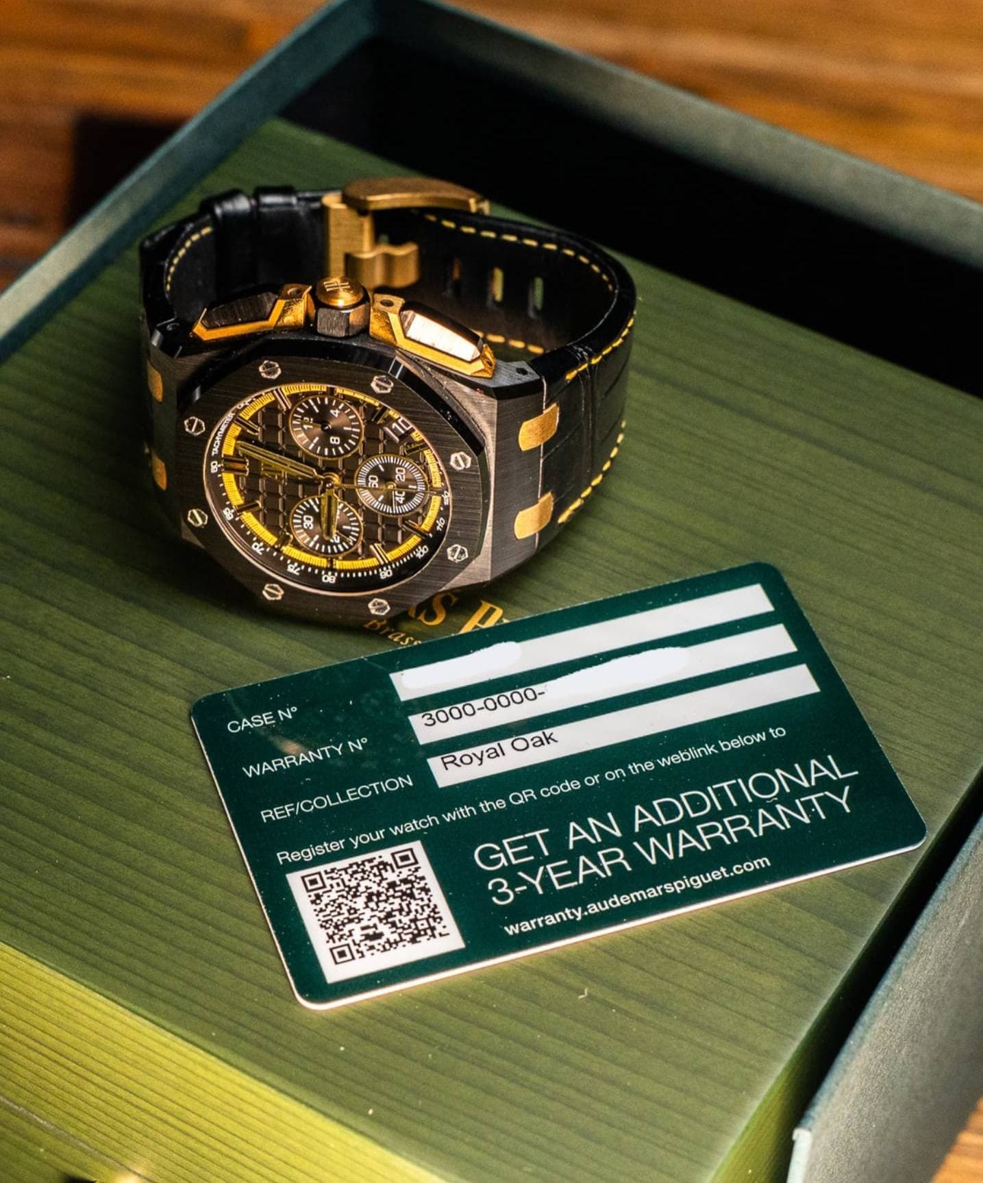 May be an image of digital watch and text that says '温品 ይሁን 8 R לי.וווו a S CASE N° - WARRANTY N° Royal Oak or o on the REF/ /COLLECTION COL Register your watch with the QR code…