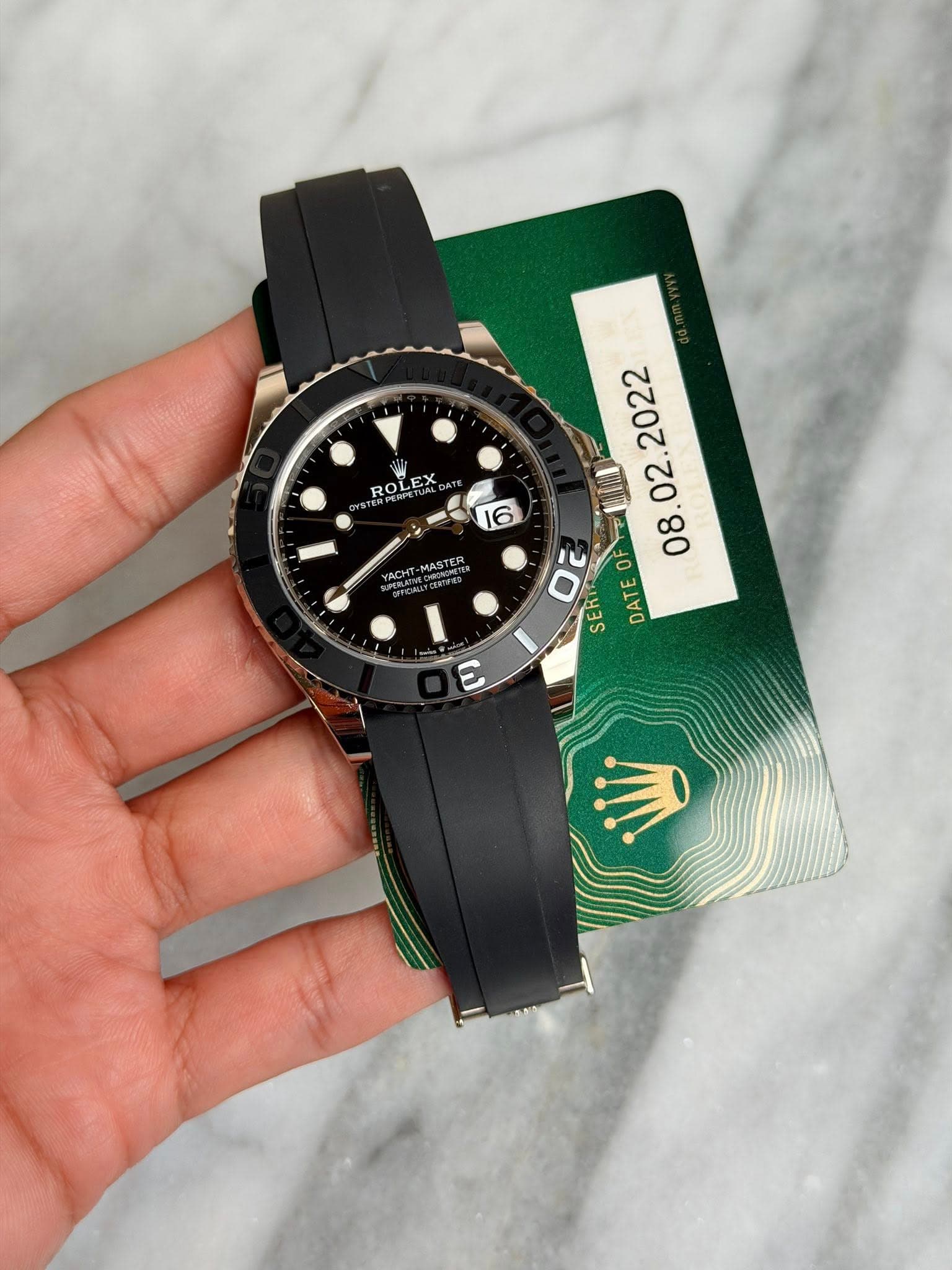 May be an image of wrist watch and text that says 'ROLEX ROL 所和E SL EX ACHT HT- MASTER O0 OF SER DATE ឧូ'